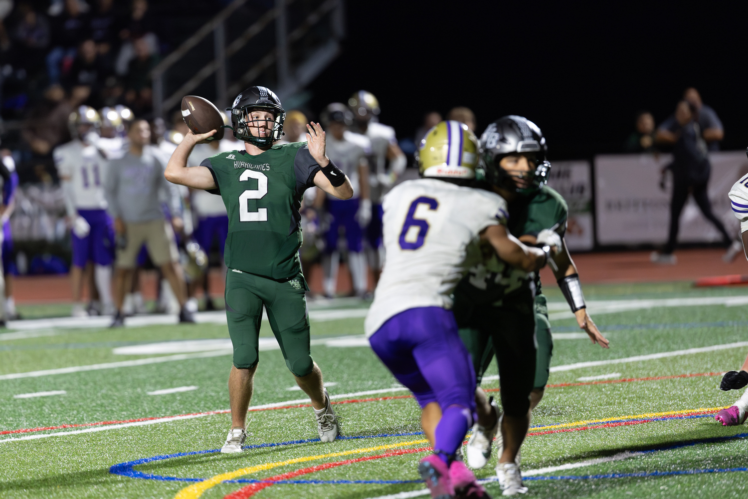 Senior quarterback Finn Drake pulls back for a pass. RON ESPOSITO