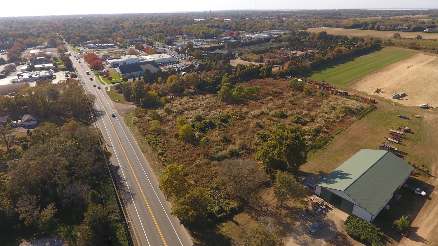 Southampton Town plans to purchase 3.8 acres of undeveloped land off Montauk Highway just east of Southampton Village, and across the street from Pumpkintown, to be used for an affordable housing project. MICHAEL WRIGHT