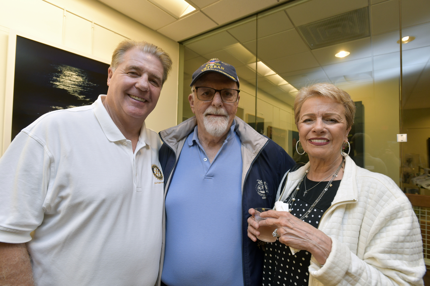 Seamus Doyle with John and Mina Neknez at the Southampton Rotary Club's kick-off cocktail party for SouthamptonFest on Friday night at the Southampton Cultural Center.  DANA SHAW