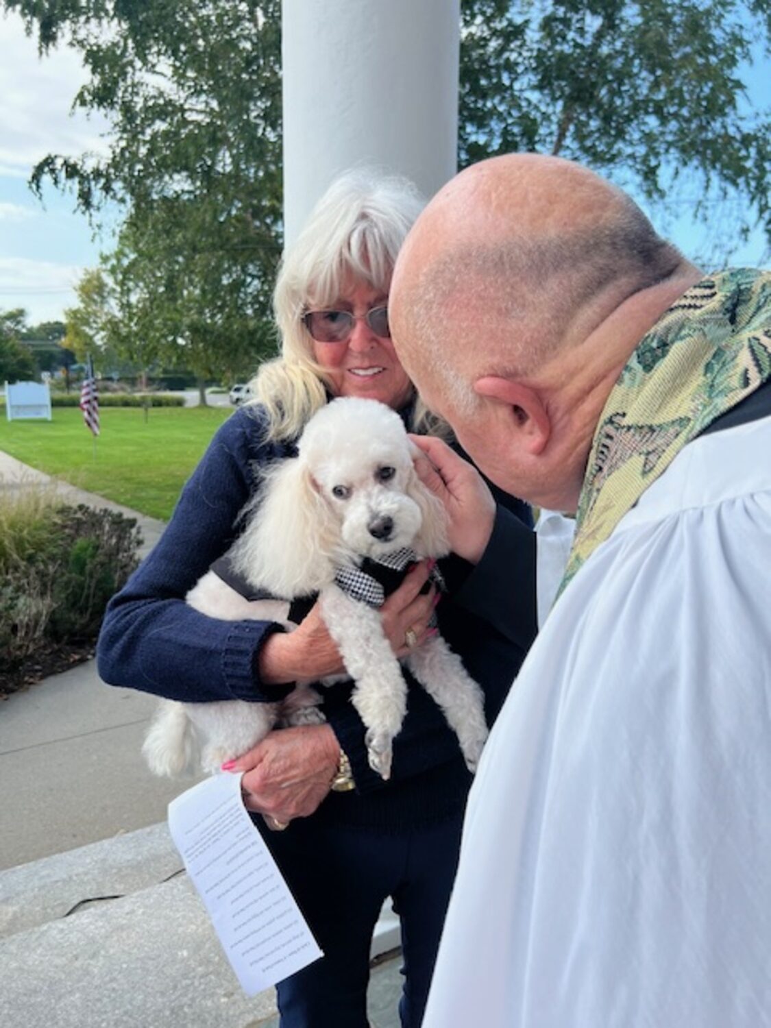 The Reverend Chris Jubinski blessed the pets of parishioners and the community on Saturday, October 5 at St. Marks Church in Westhampton Beach. COURTESY TOM HADLOCK