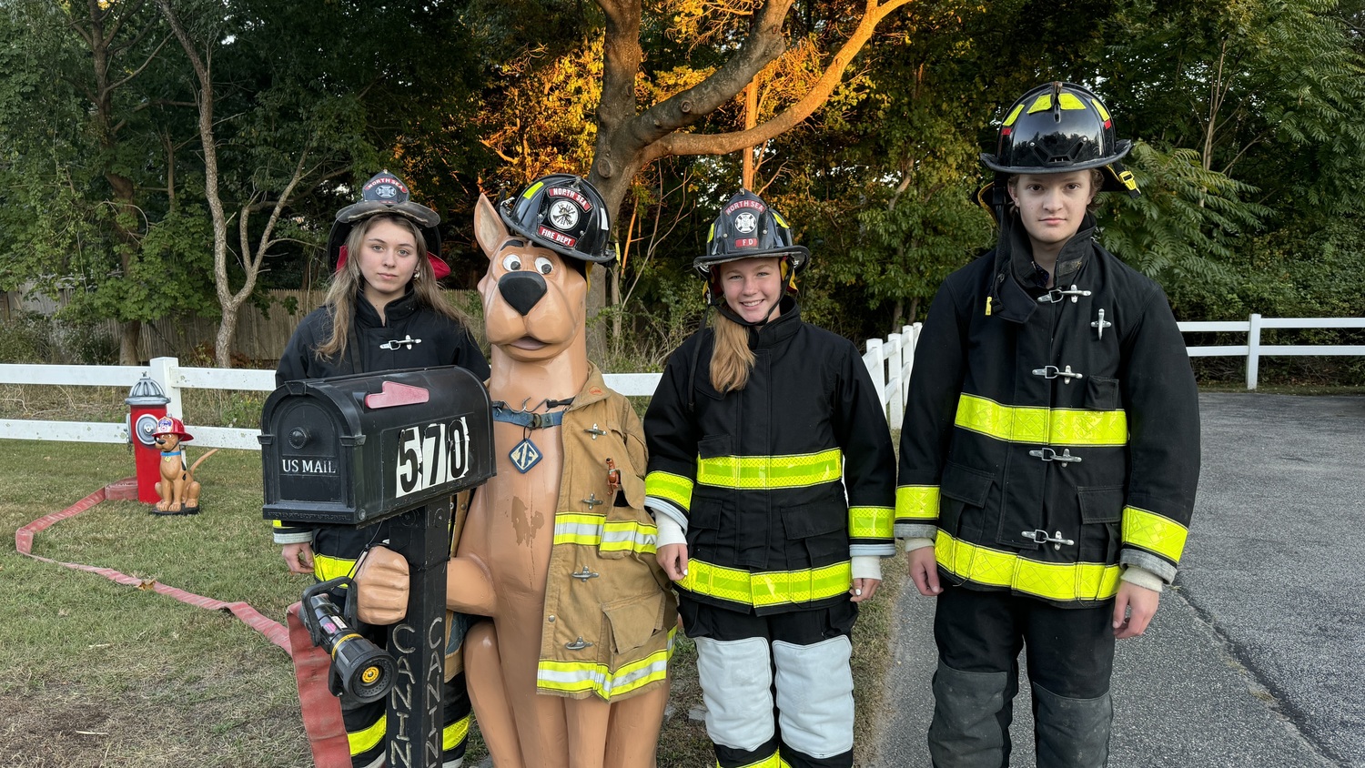 October is Fire Prevention Month. North Sea Jr fire fighters Savannah, Carlie, and Colin stopped by to visit Hampton Scooby, an 