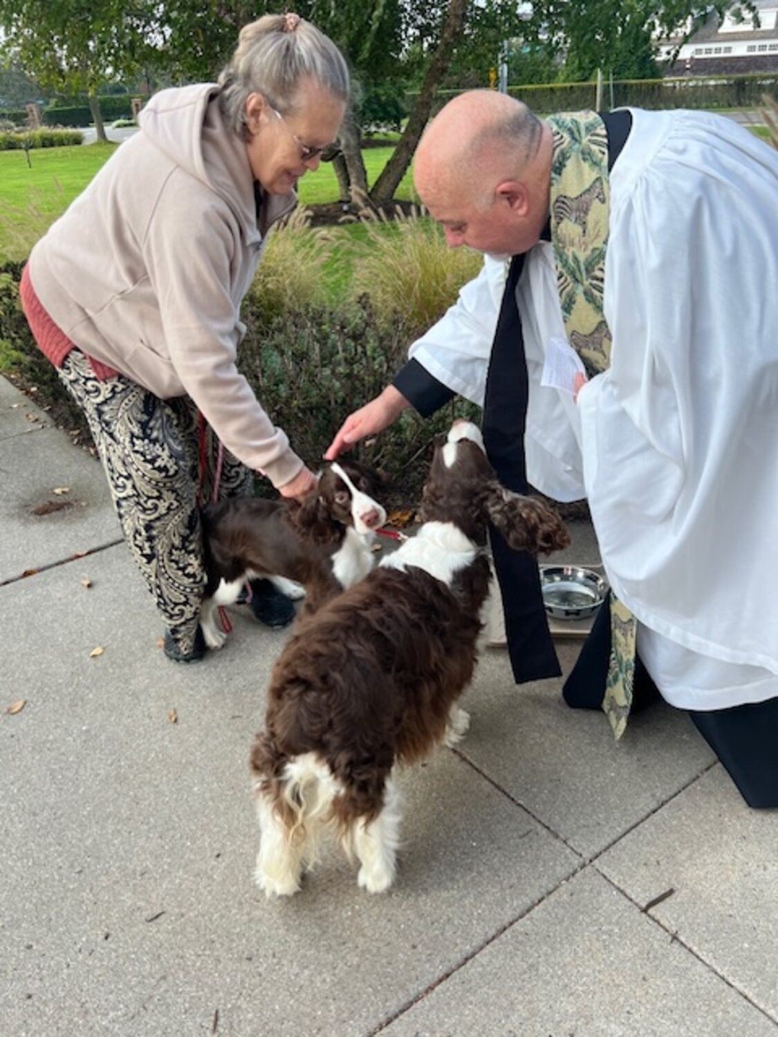 The Reverend Chris Jubinski blessed the pets of parishioners and the community on Saturday, October 5 at St. Marks Church in Westhampton Beach. COURTESY TOM HADLOCK