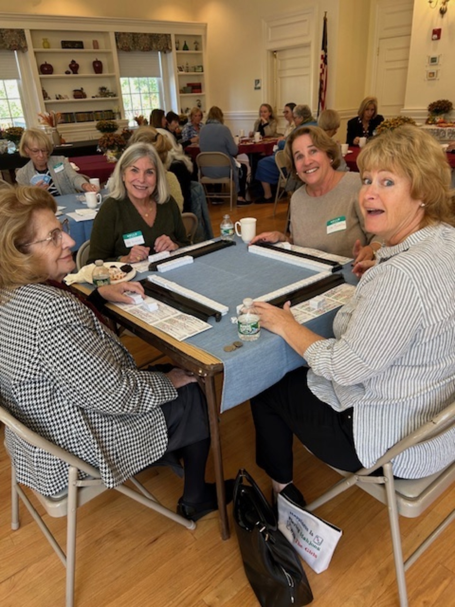 Members of the Westhampton Woman's Club gathered for a fundraiser for college scholarships to be awarded to graduates of Westhampton Beach High School last week at St. Mark's Church parish hall. The successful fundraiser was chaired by Sharyn Wetjen, left, and Barbara Morgan, right, under the leadership of club president, Kristin Catanzaro. COURTESY TOM HADLOCK