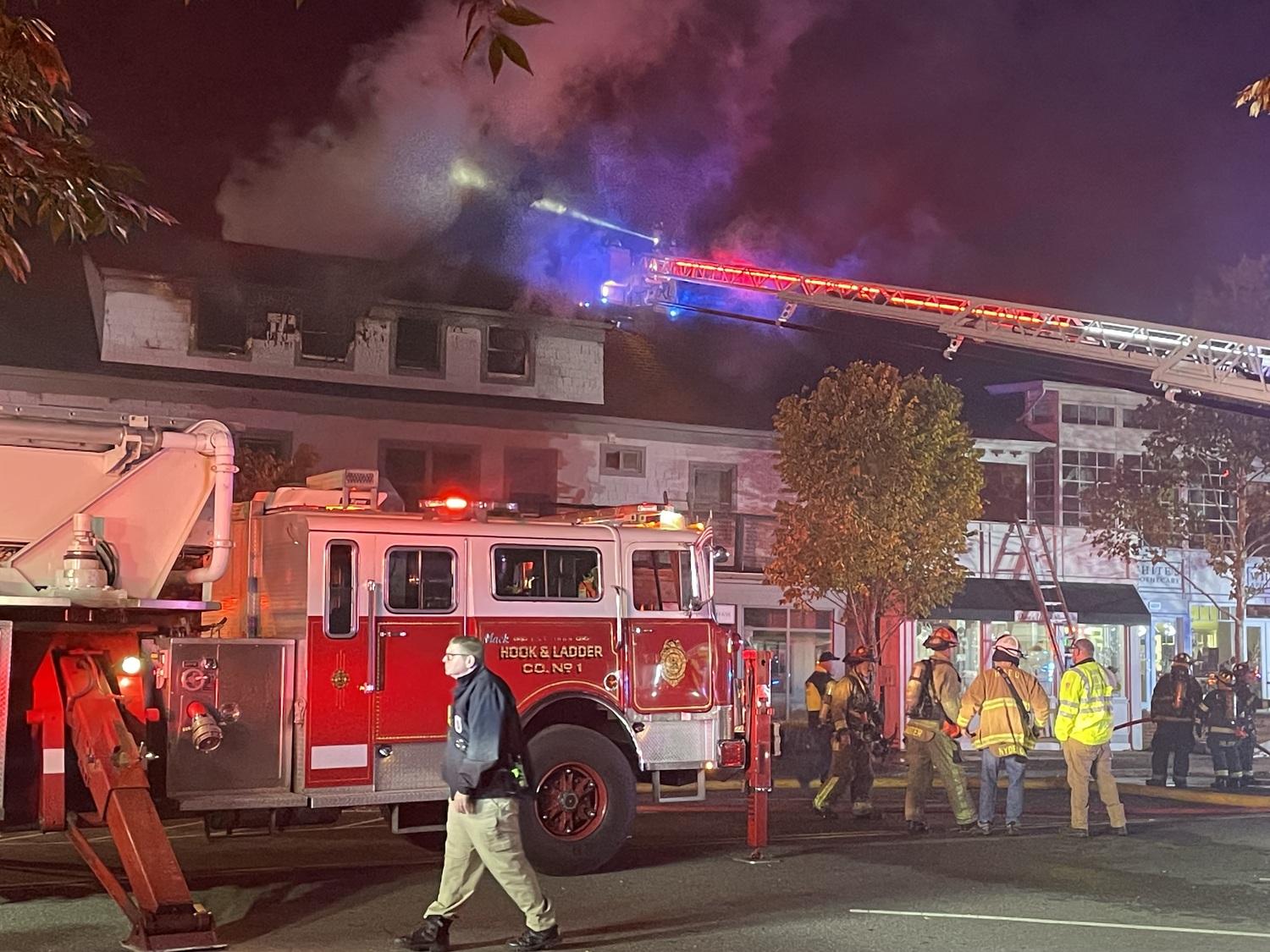 More than a dozen people escaped a fire, apparently uninjured, in a Westhampton Beach building early Friday morning. NANCY ST. JOHN