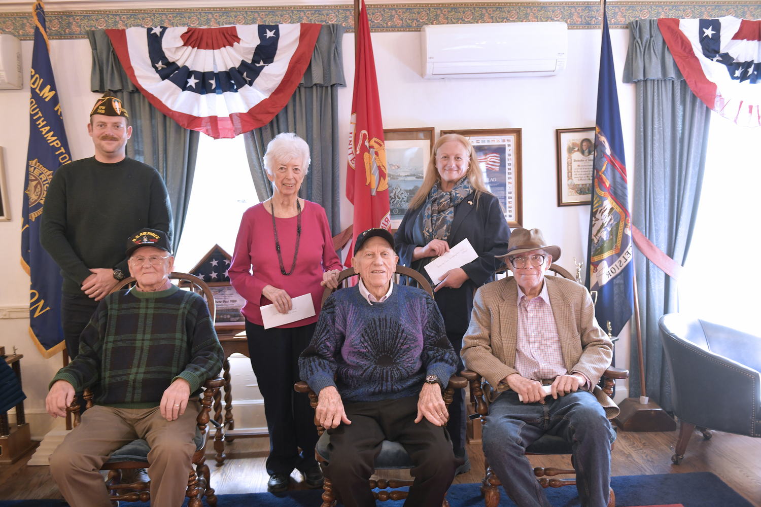 The final meeting of the Eastern Long Island Chapter of the Korean War Veterans was held on Saturday at Veterans Hall in Southampton Village. Remaining funds from the chapter were donated to the Southampton Fire Department, the Veteran's Home and the Southampton High School Mariners Patriots Club. Seated left to right are chapter members Stanley Penske, Donald Schreiber and James Witker. Standing are, left to right Richard McMahon, Nora Schreiber and Thea Fry.  DANA SHAW