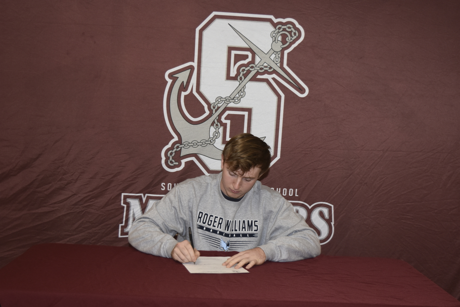 Southampton senior Daniel McDonnell signs his letter of intent to play baseball at Roger Williams University.    DREW BUDD