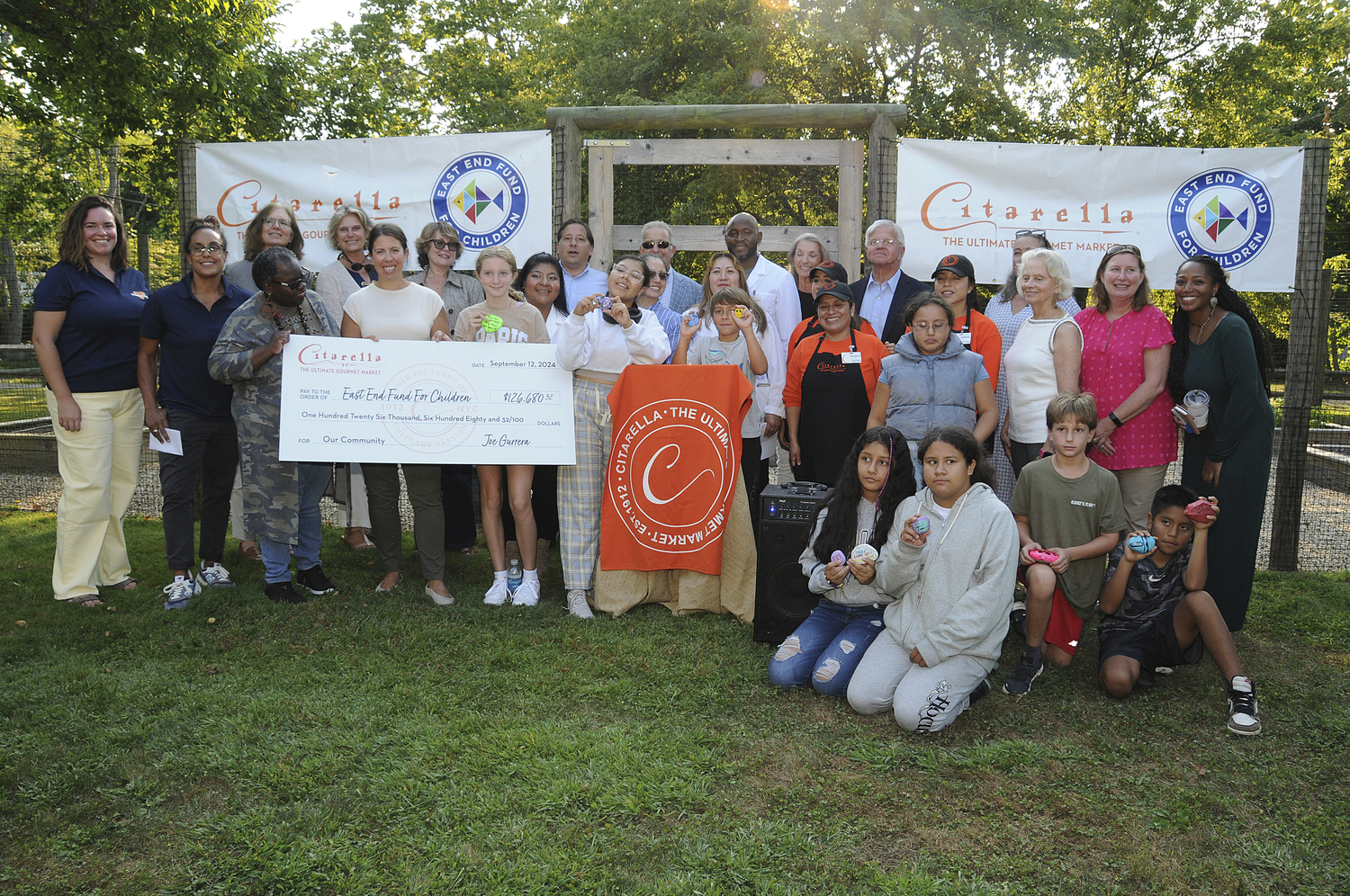 On September 12 representatives from the East End Fund for Children and state and local officials gathered at Citarella in Bridgehampton as owner Joe Gurrera presented a check to the organization for $126,680.32, proceeds from Citarella's 2024 summer fundraising campaign. Shoppers at each of the gourmet markets three East End locations were encouraged to donate at the time of their purchase.     RICHARD LEWIN