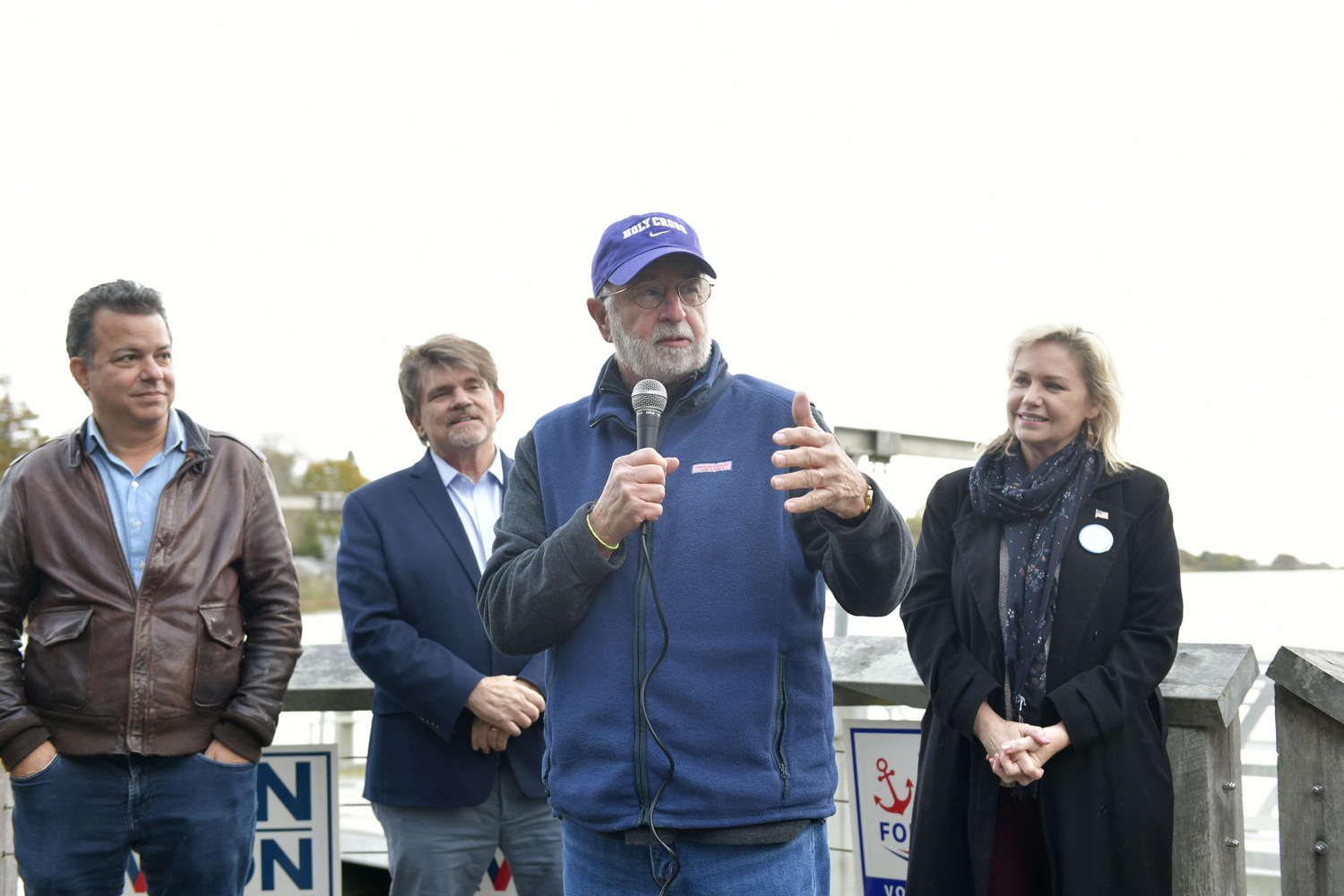 Former Congressman Tim Bishop with Democratic candidates, John Avlon, Tommy John Schiavoni and Sarah Anker at a rally in Agawam Park in Southampton on November 4.  DANA SHAW