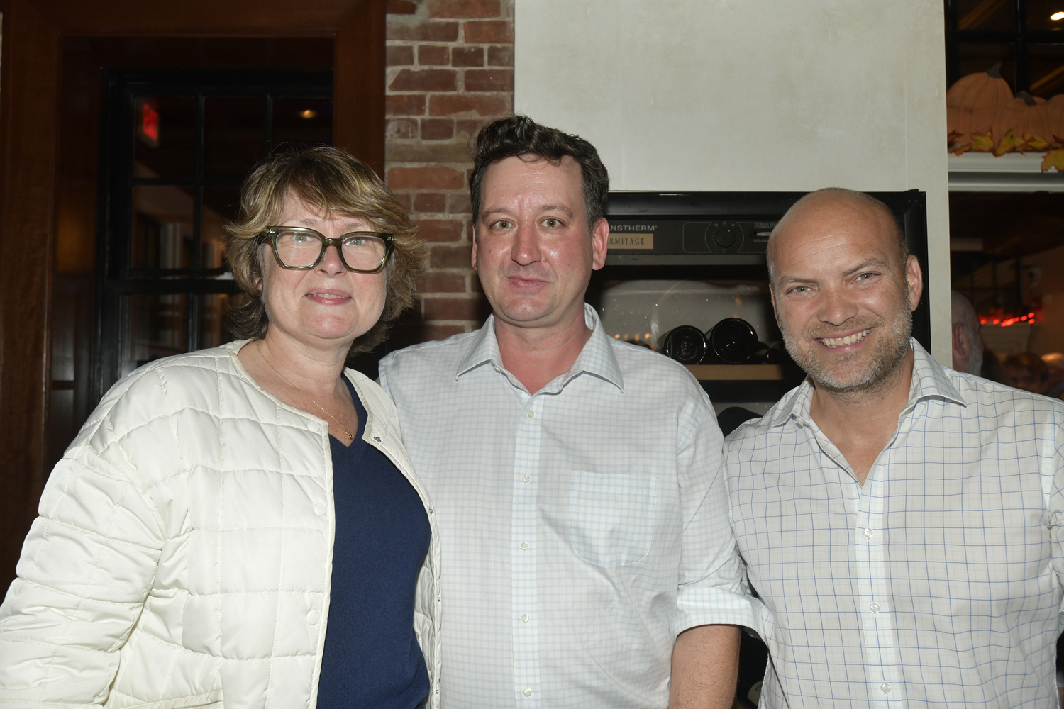 East Hampton Town Supervisor Kathee Burke-Gonzalez, newly elected town councilman Ian Calder-Piedmonte and councilman David Lys at Page in Sag Harbor on election night.   DANA SHAW