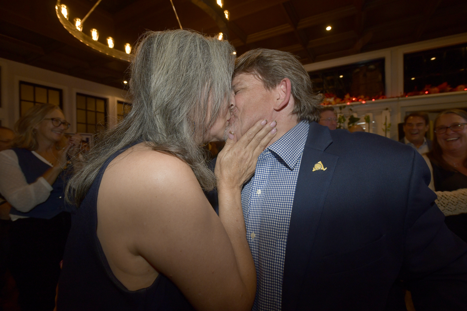 Tommy John Schiavoni, kisses  his wife Andrea a, after winning the 1st District Assembly race against Republican Stephen Kiely. DANA SHAW