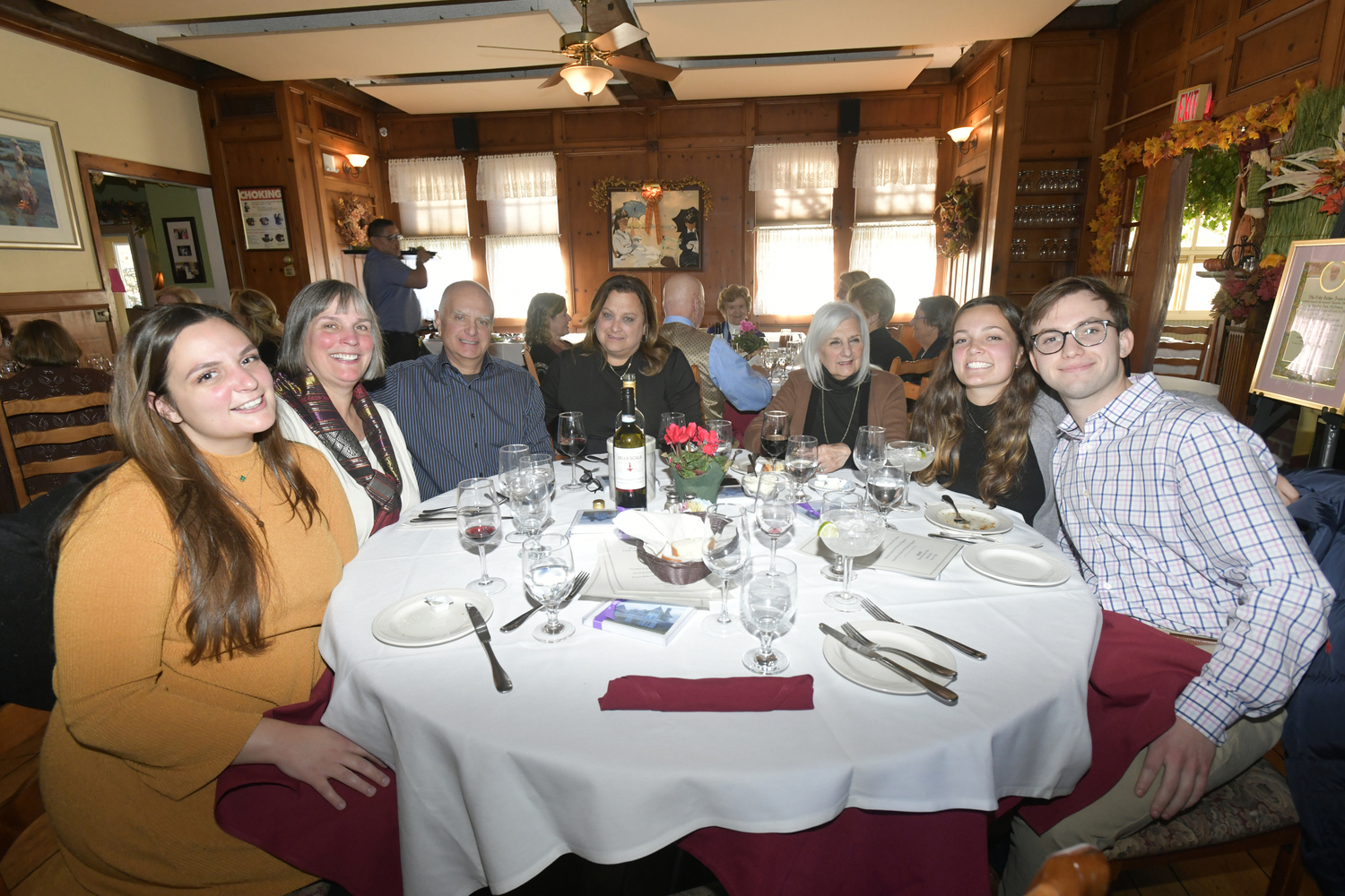 Sara Bucking, Diane Bucking, Philip Bucking, Lisa Field, Rosann Bucking, Heidi Bucking and Matthew Lampert at the Cor Marin luncheon at Villa Paul on Saturday.  DANA SHAW