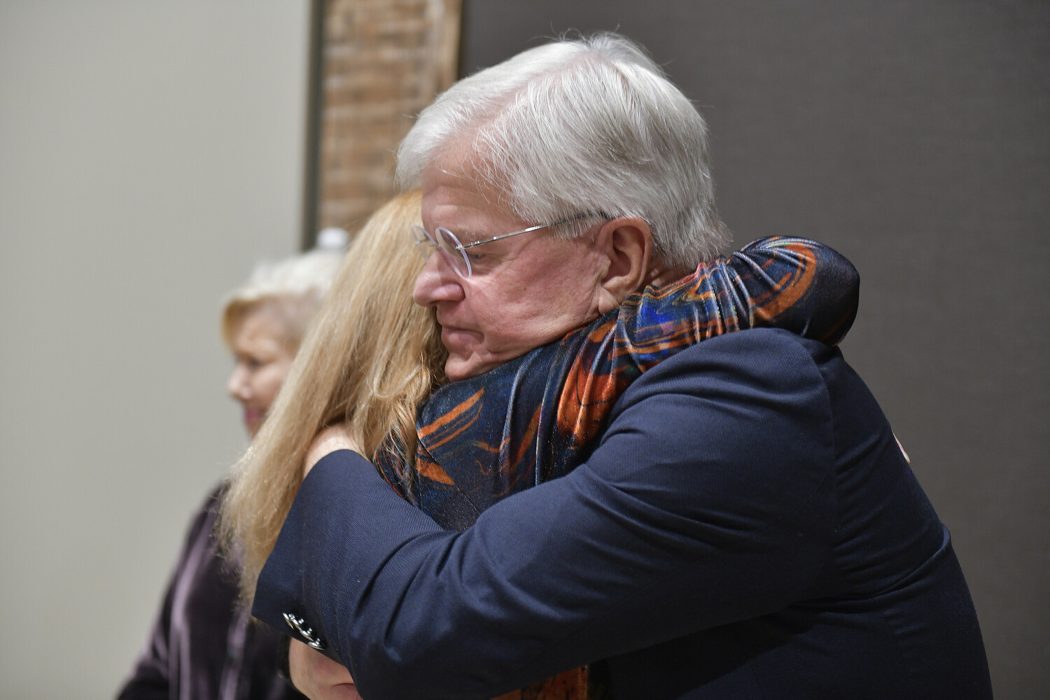 Assemblyman Fred W. Thiele Jr. hugs his wife Nancylynn after receiving the Sag harbor Partnership Community Service award on November 22.  DANA SHAW