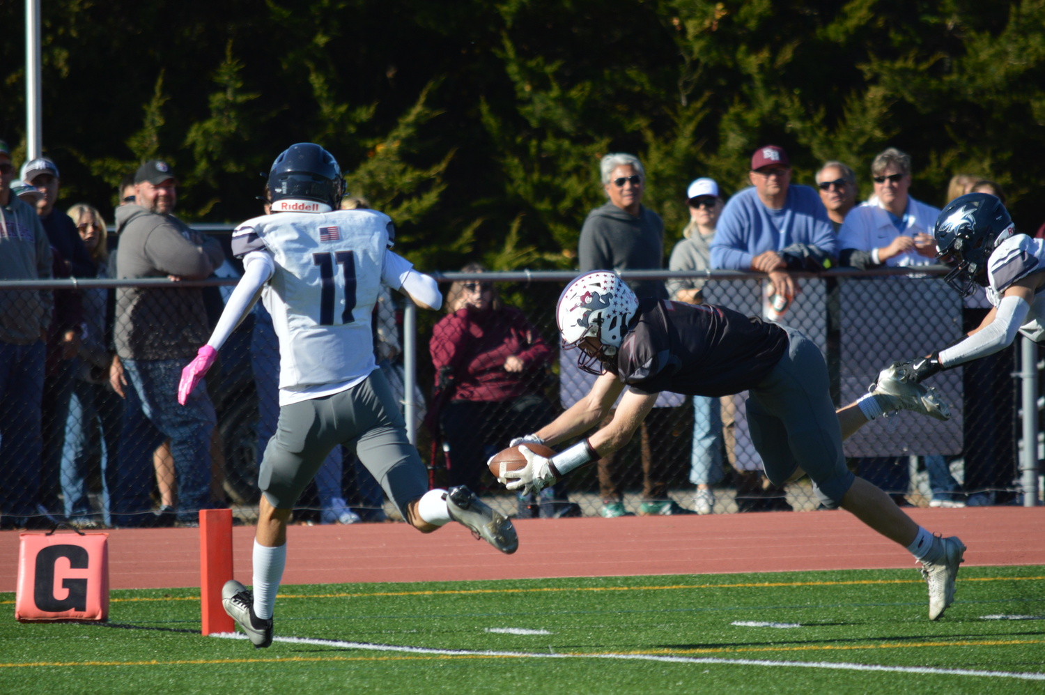 Livs Kuplins dives for the endzone.   GAVIN MENU