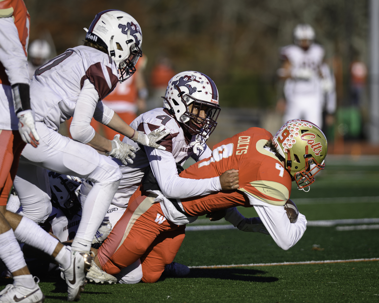 Bridgehampton junior Alex Davis takes down Hills West senior Anthony Raio.   MARIANNE BARNETT