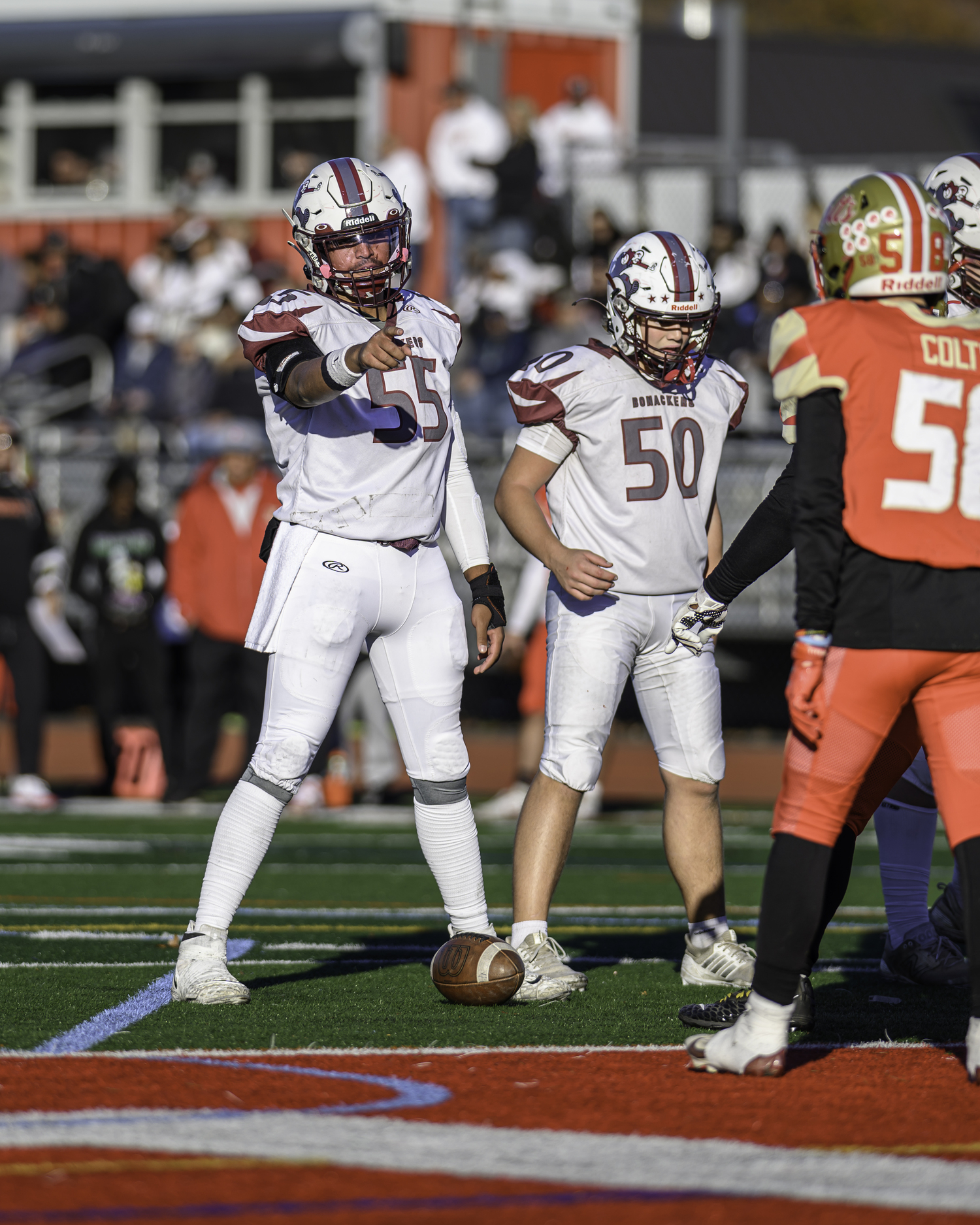 East Hampton senior center Aman Chugh points out the Hills West defense.  MARIANNE BARNETT