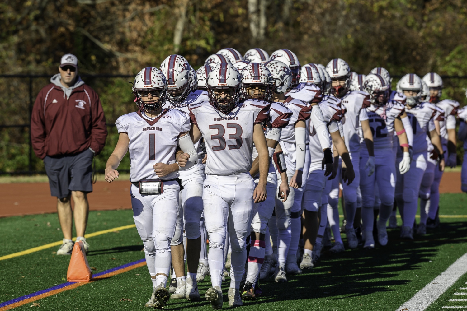 The Bonackers head on to the field at Half Hollow Hills West on Saturday.   MARIANNE BARNETT