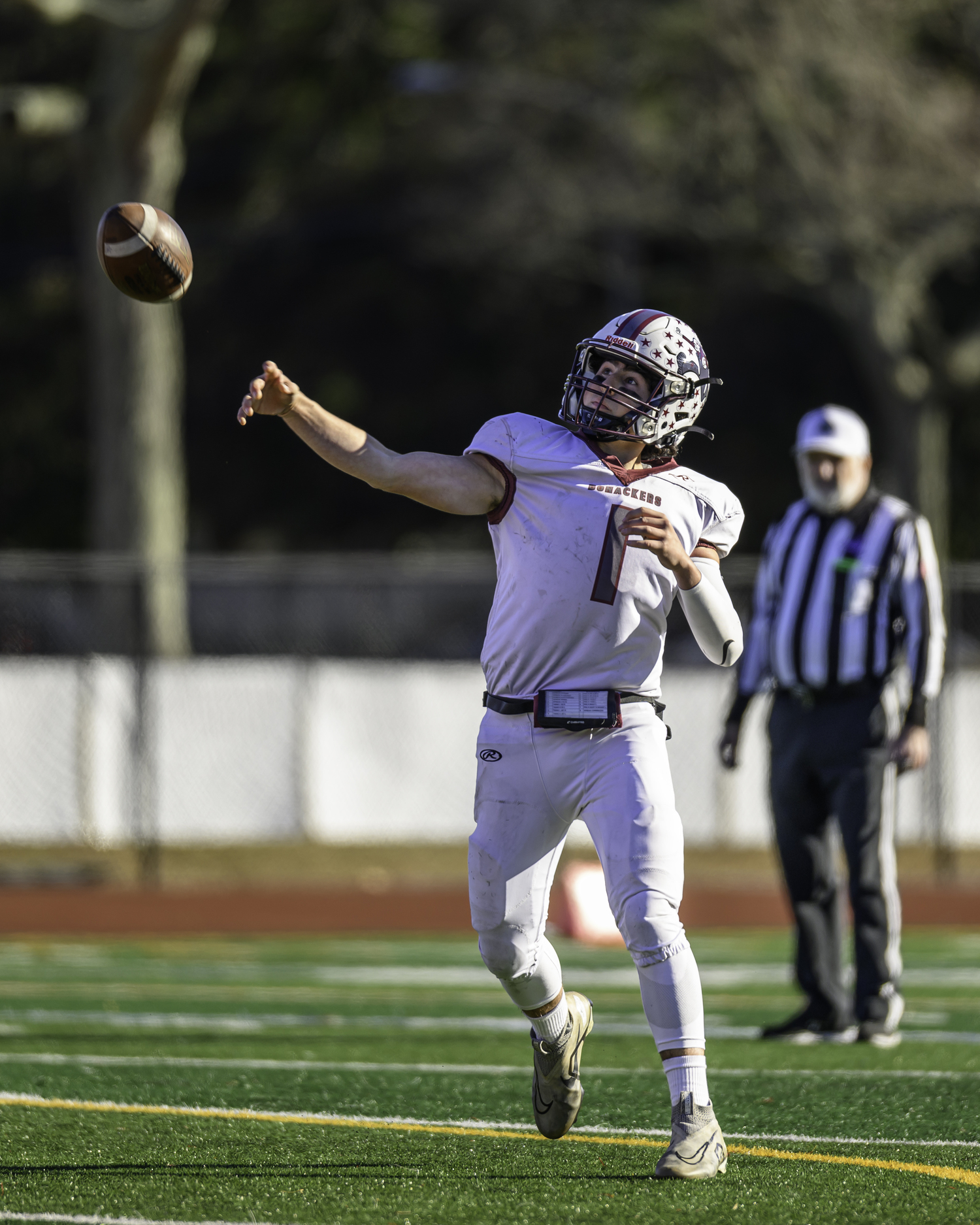 East Hampton junior quarterback Theo Ball passes the ball.   MARIANNE BARNETT