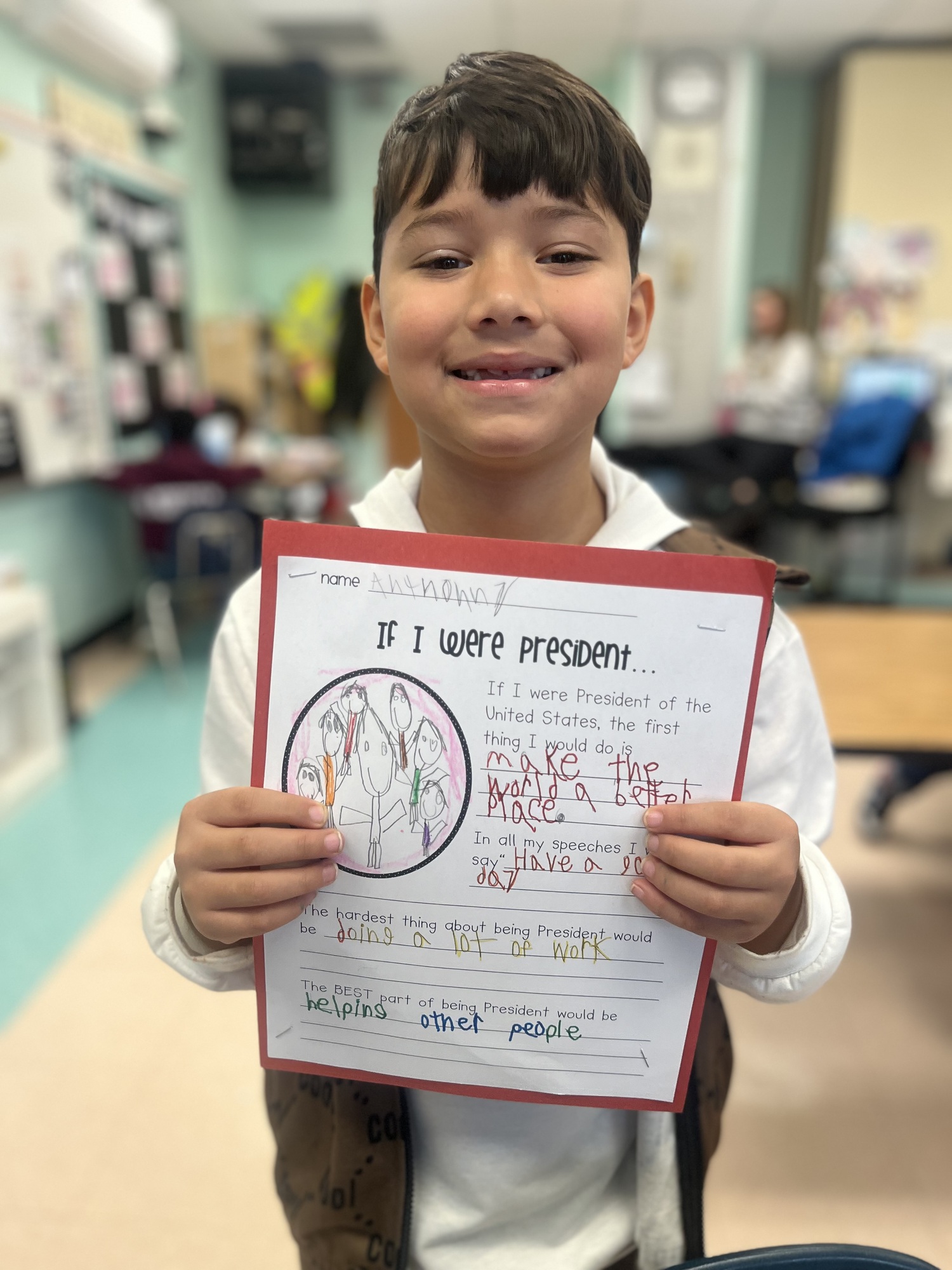 After learning about Election Day and what it means vote, Hampton Bays Elementary School second grade students in Erin McDermott’s class brainstormed the positives and negatives to being president and WROTE  papers about what they would do if they were elected as president. Anthony Prada Vallejo with his essay. COURTESY HAMPTON BAYS SCHOOL DISTRICT