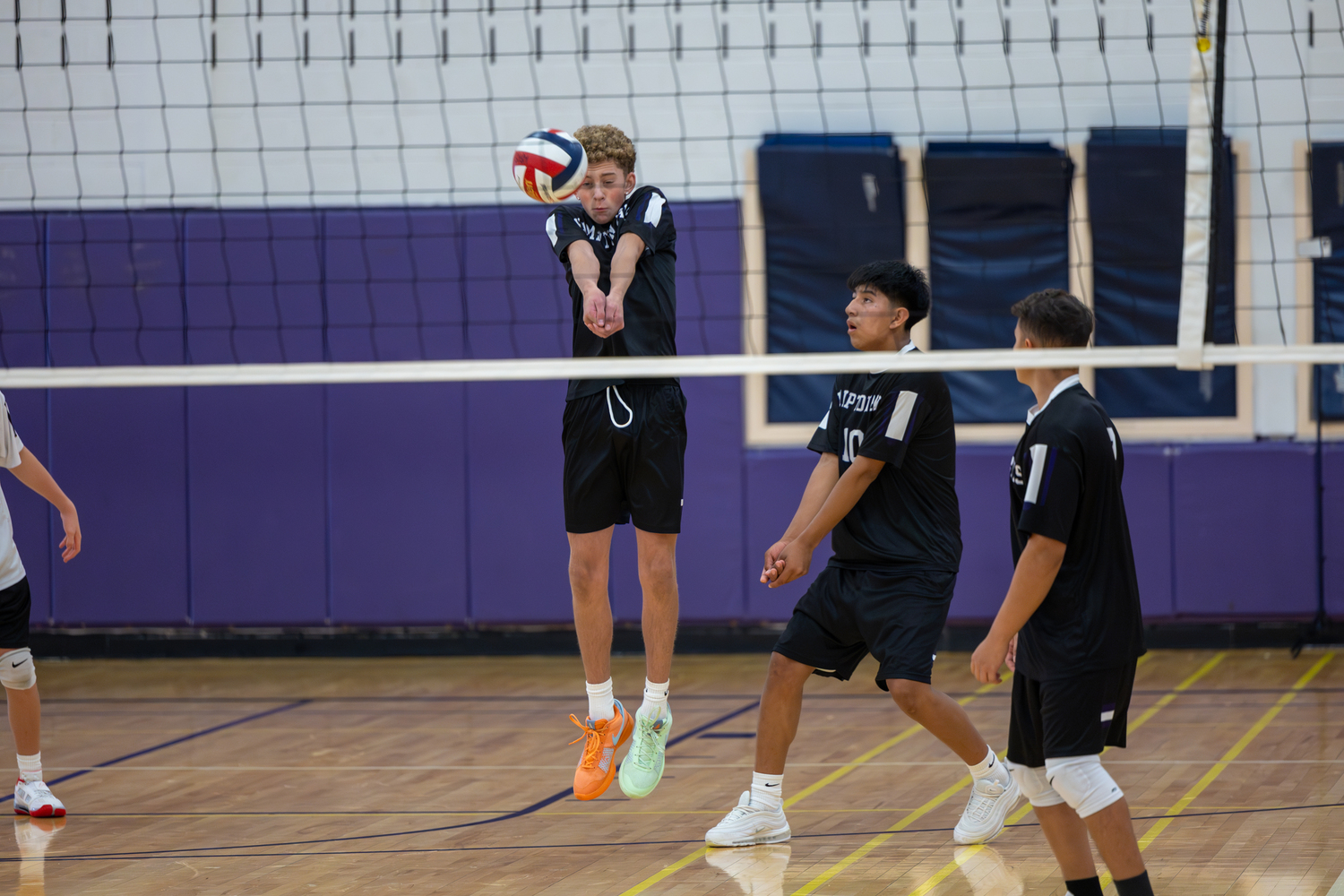 Junior Brian Spellman receives the ball. RON ESPOSITO