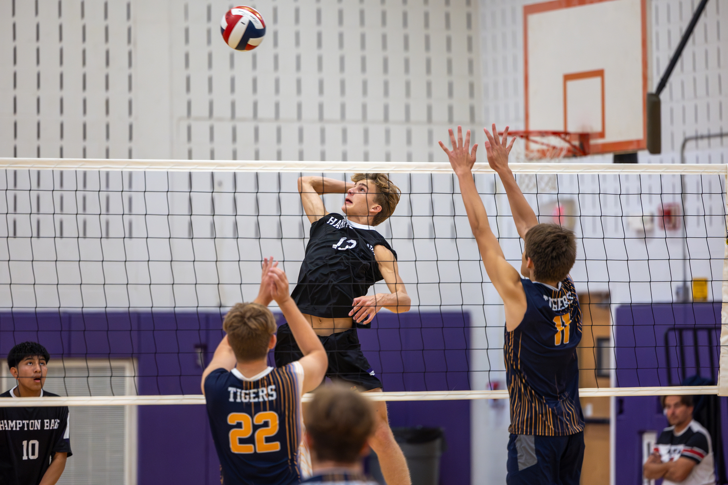 Junior Charlie Patek leaps for the ball. RON ESPOSITO