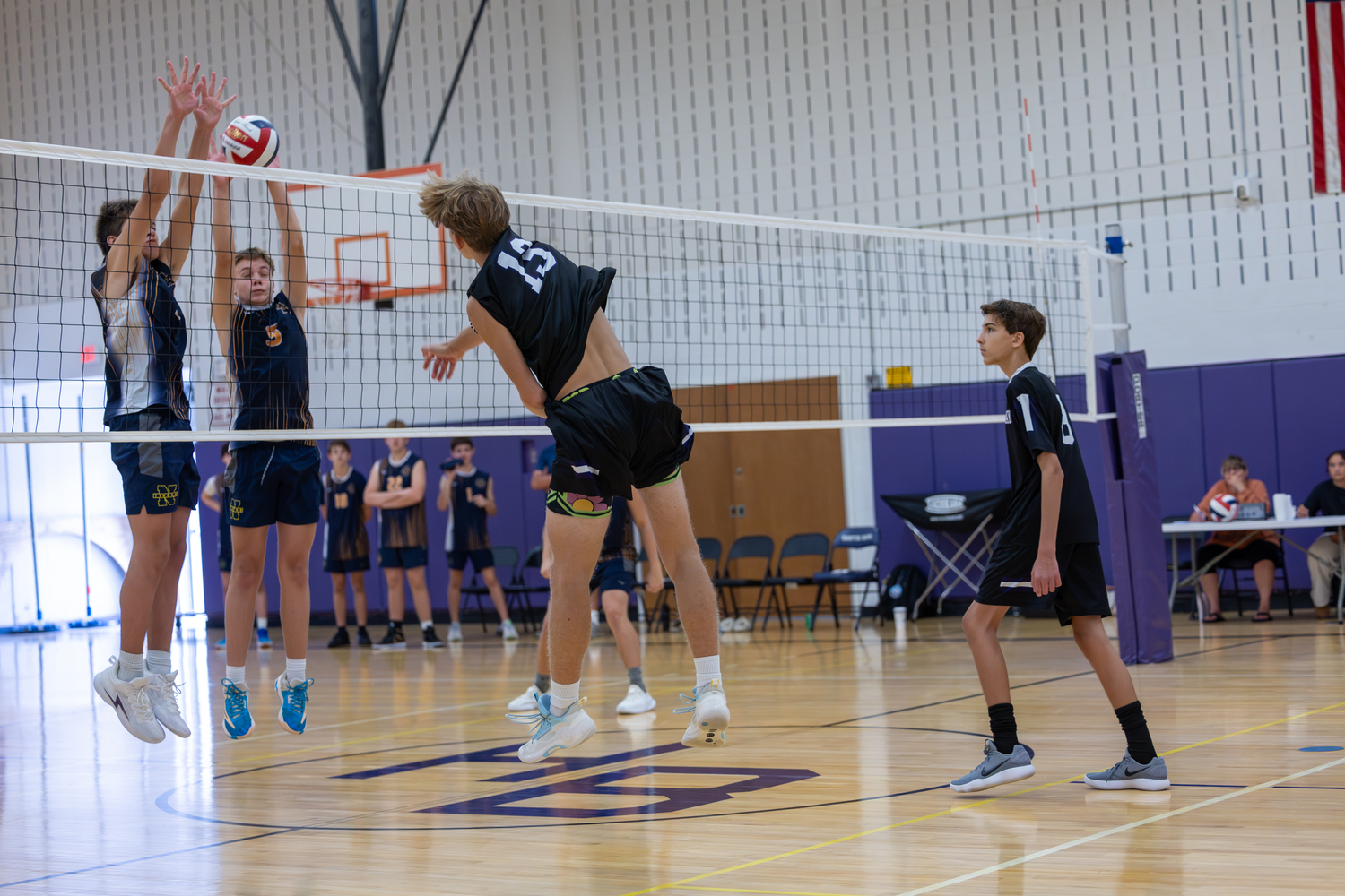 Junior Charlie Patek spikes down a kill. RON ESPOSITO