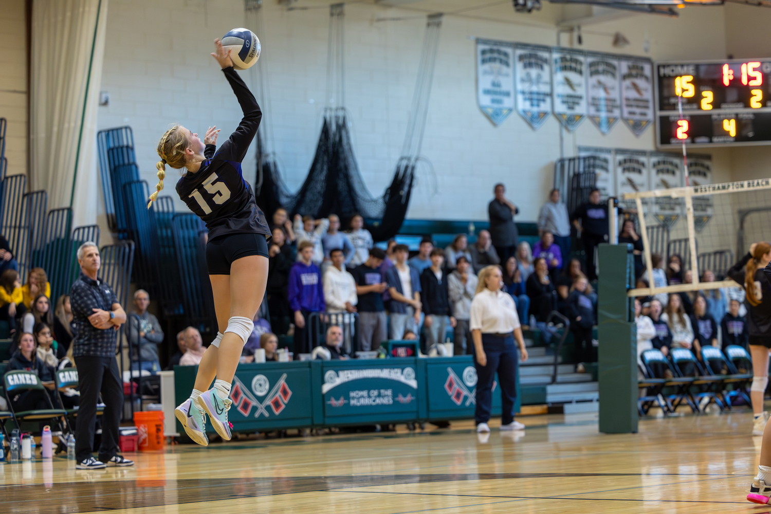 Hampton Bays junior outside hitter Taylor Meyers serves. RON ESPOSITO