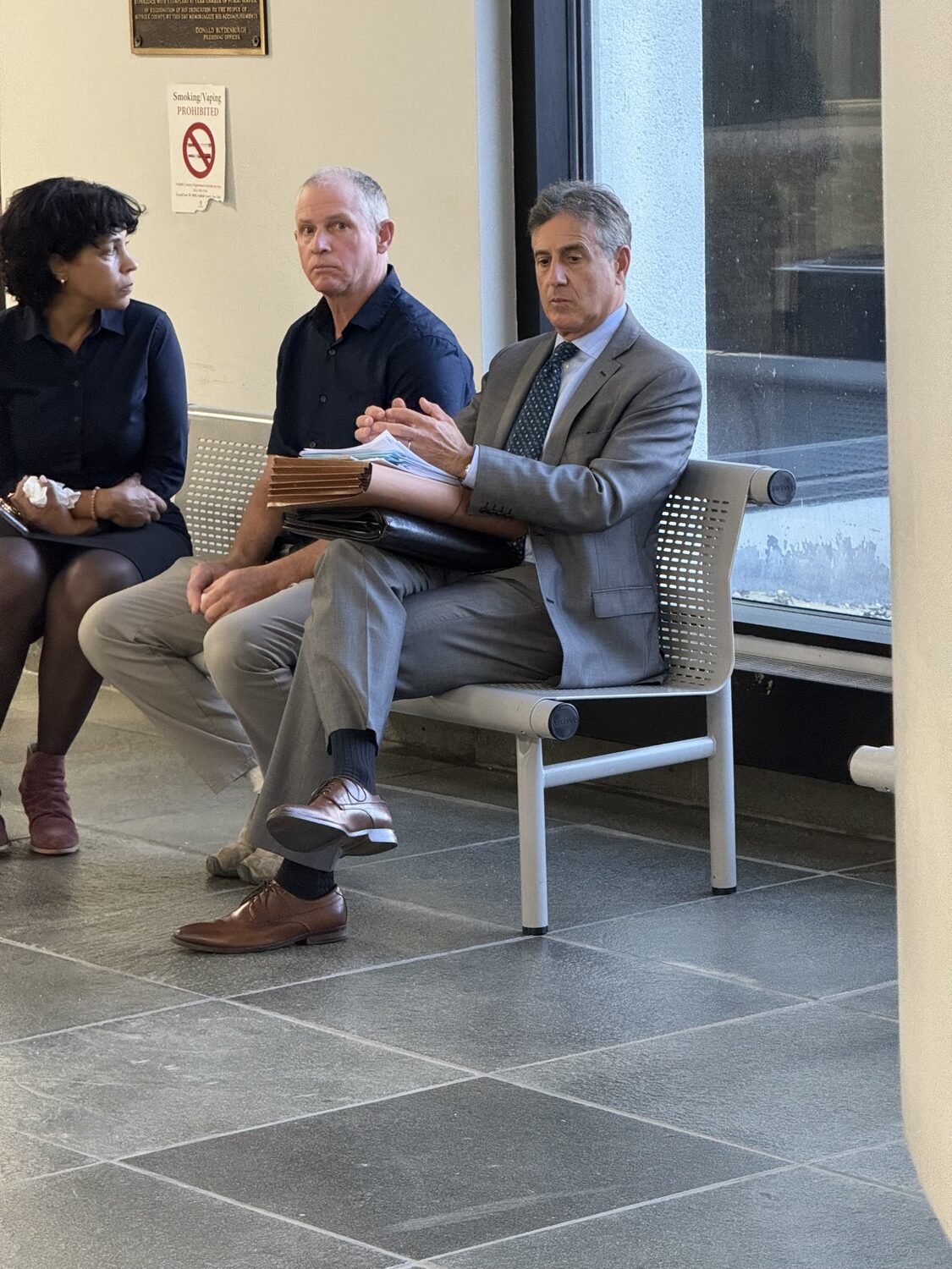 Pamela and Peter Miller in Suffolk County Court in Riverside on Thursday for their sentencing with their attorney, Edward Burke Jr.  T.E. McMORROW