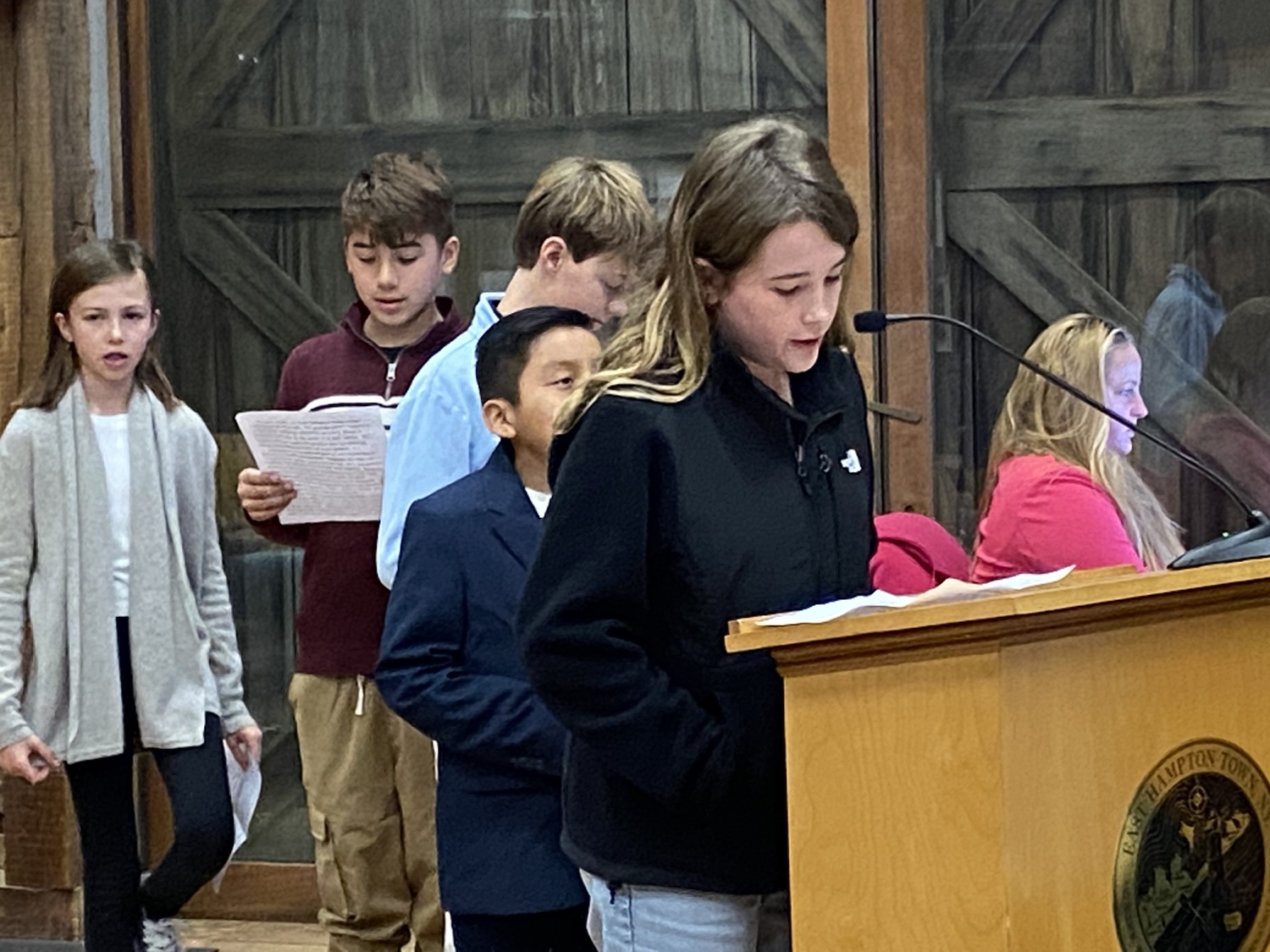 Abigayle Leland of East Hampton Middle School's Do Good Be Good Club told the Town Trustees that she and her colleagues glued around 10,000 eelgrass seeds to more than 1,000 clams. CHRISTOPHER WALSH