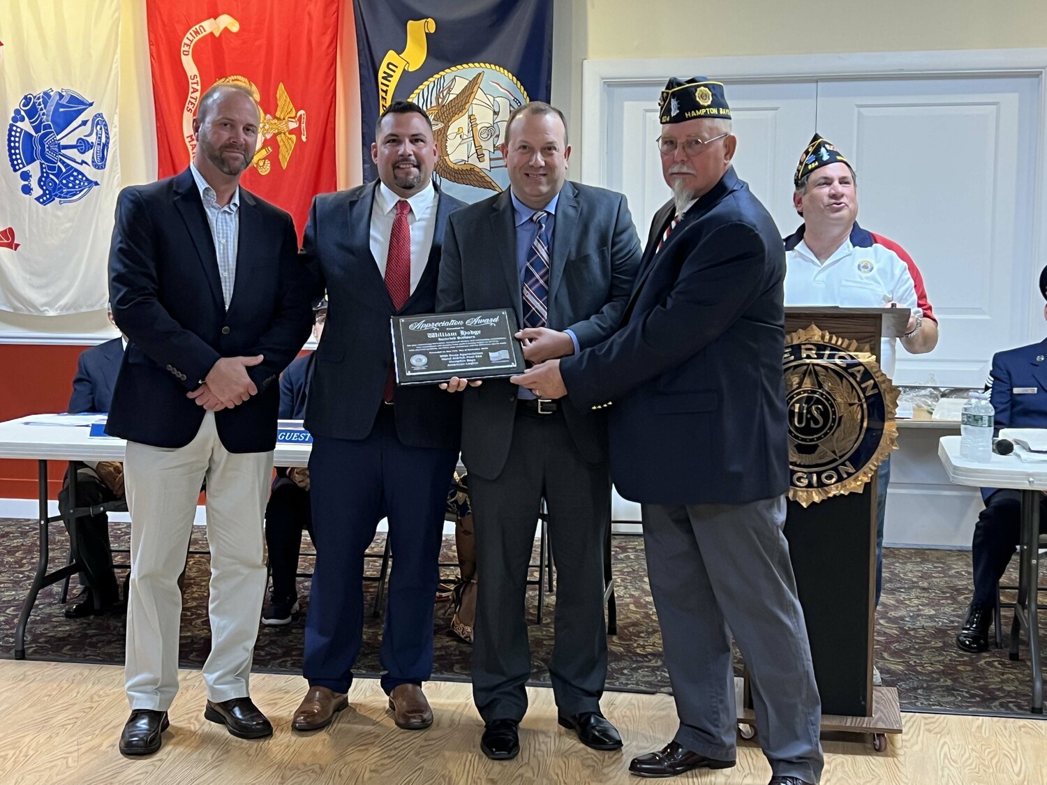 Representatives from Sumrick Builders were presented with a plaque for all of their work on the renovations at the Hampton Bays American Legion,