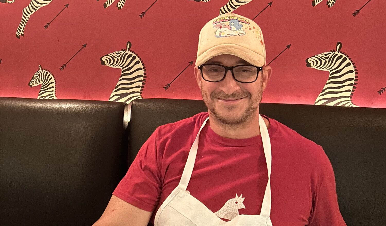 Jason Weiner owner and chef at Almond in the dining room of his restaurant. KRISTEN HIMMELBERG