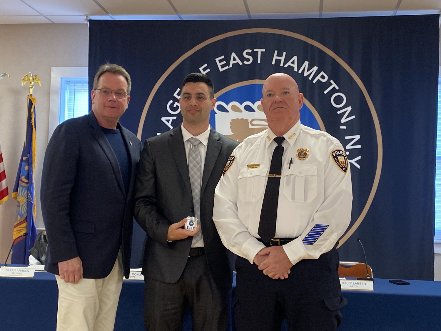 Mayor Jerry Larsen, Officer James Fusco and Chief Jeffrey Erickson at the East Hampton Village Board meeting on Friday. CHRISTOPHER WALSH