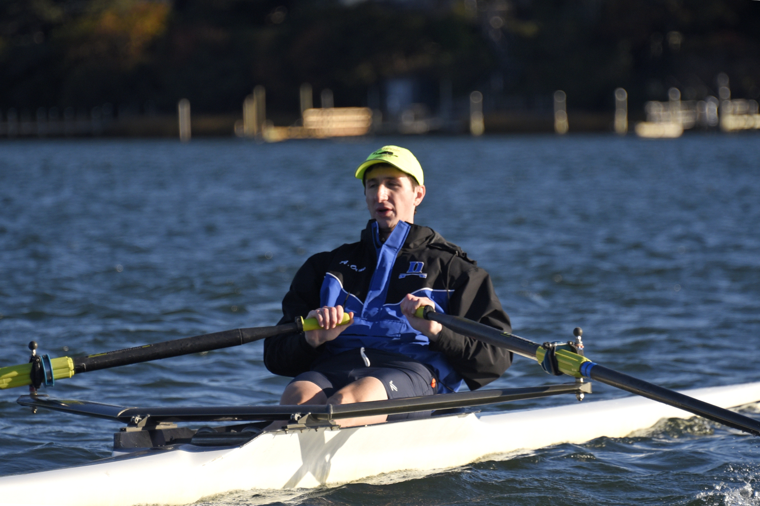 Concentration to put every muscle into each stroke is written on Team Orange Andrew Orme’s face.  MICHAEL MELLA