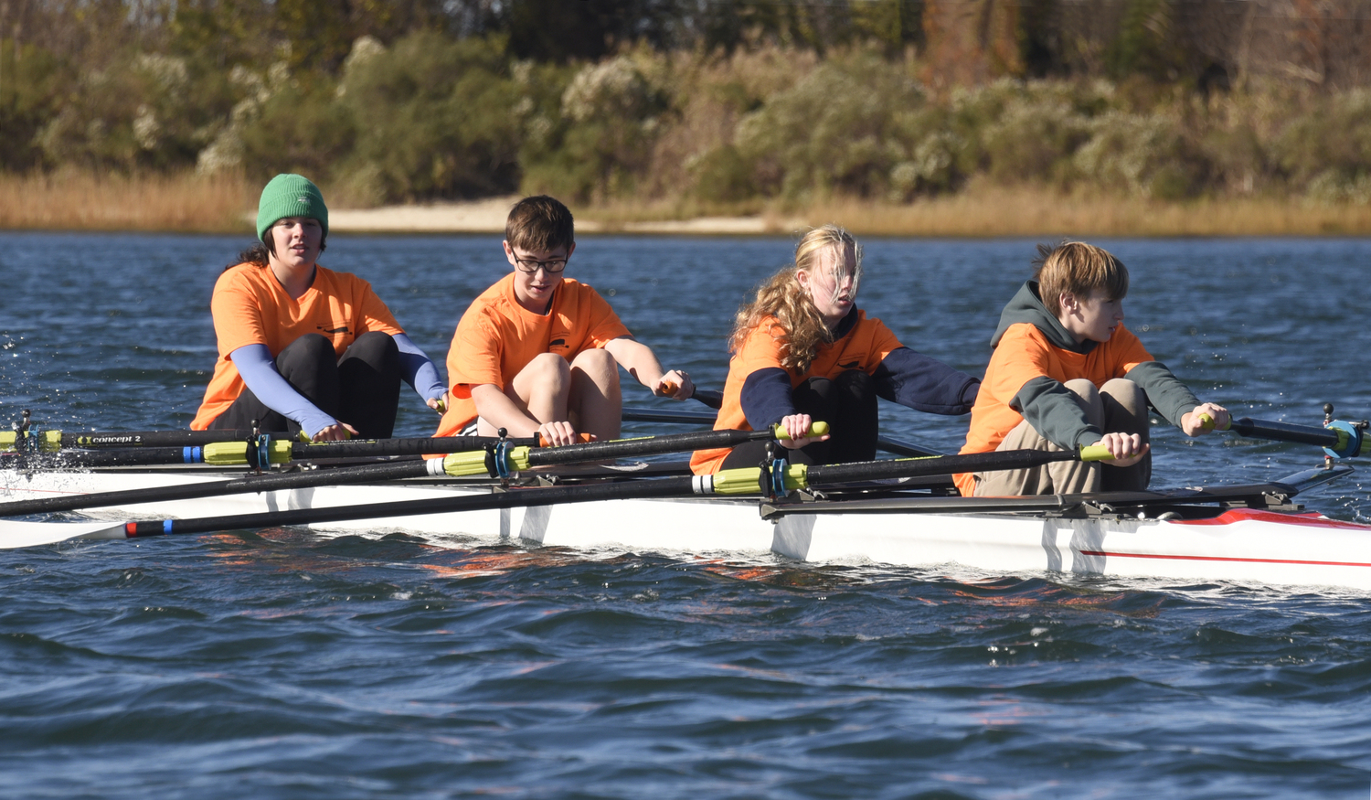 High school kids putting their all into each stroke helped their Team Orange win gold. MICHAEL MELLA