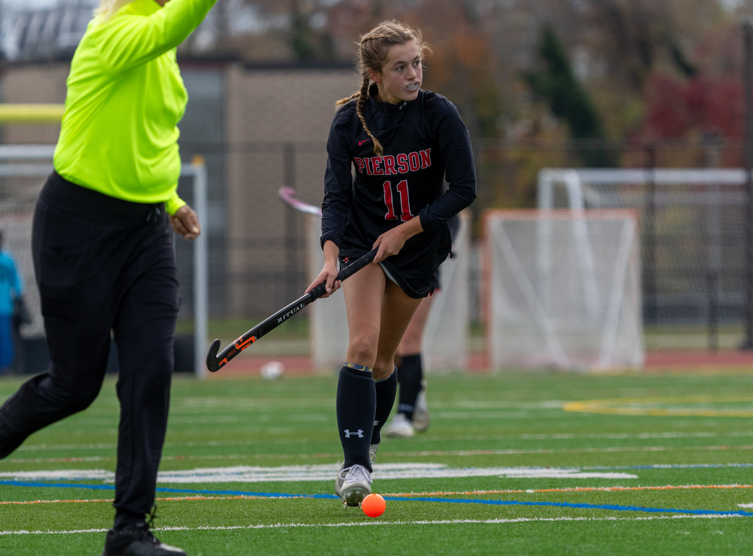 Pierson junior Clio Halweil looks upfield.   RON ESPOSITO