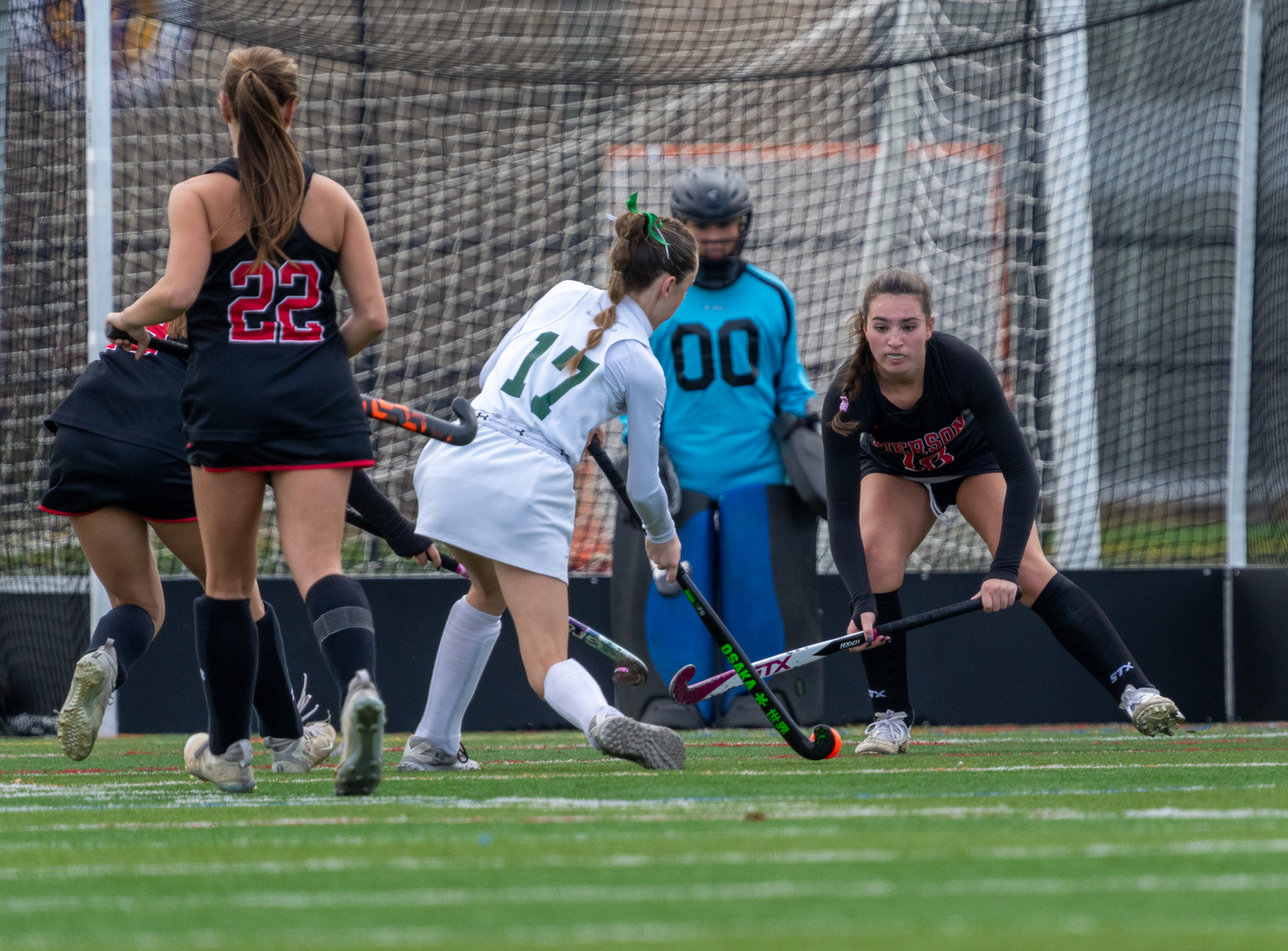 Pierson freshman Grayson Knapik stares down an oncoming shot from Carle Place junior Grace Esposito.   RON ESPOSITO