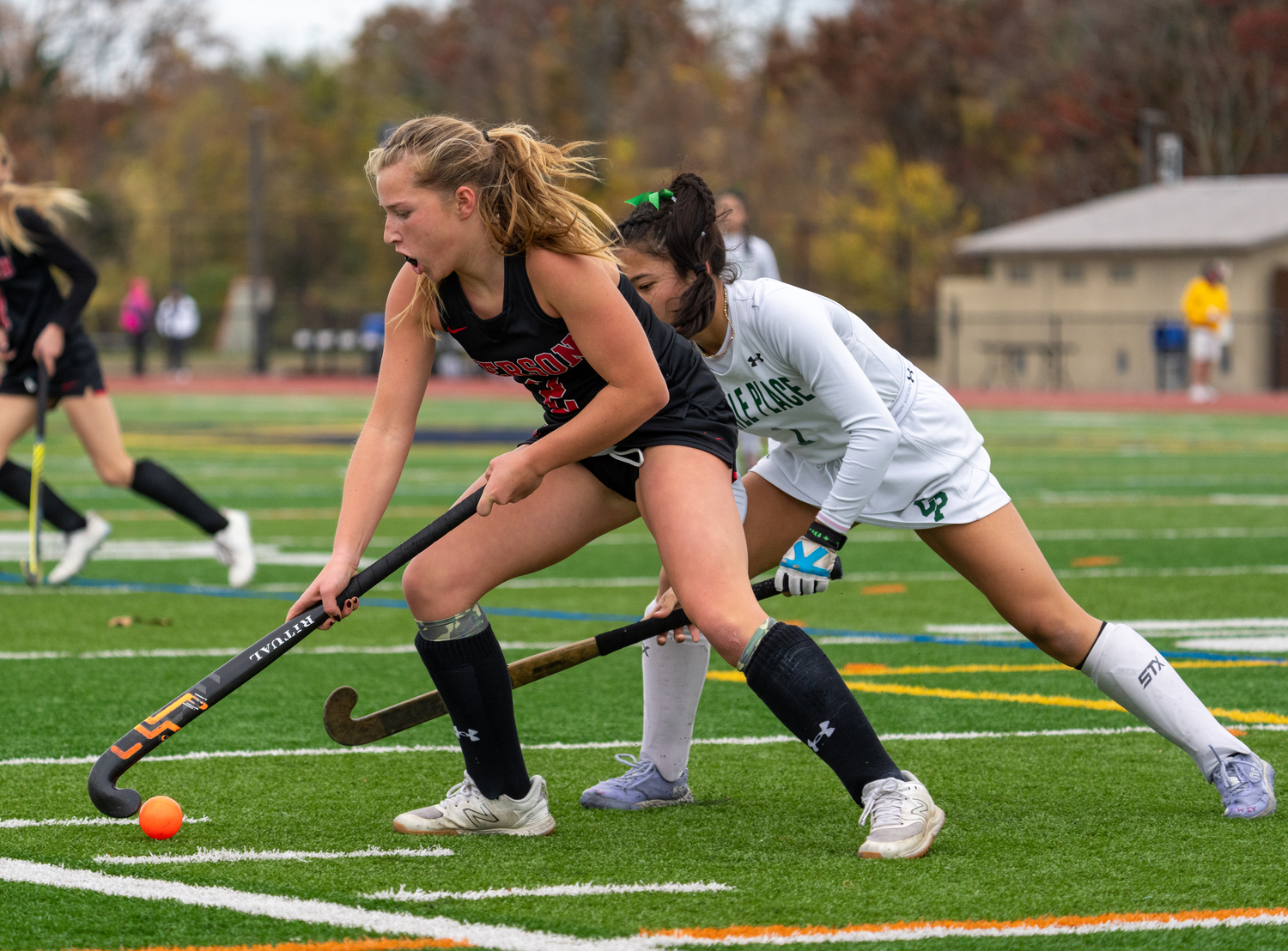 Pierson junior Abby Perello tries to back down a Carle Place player.   RON ESPOSITO