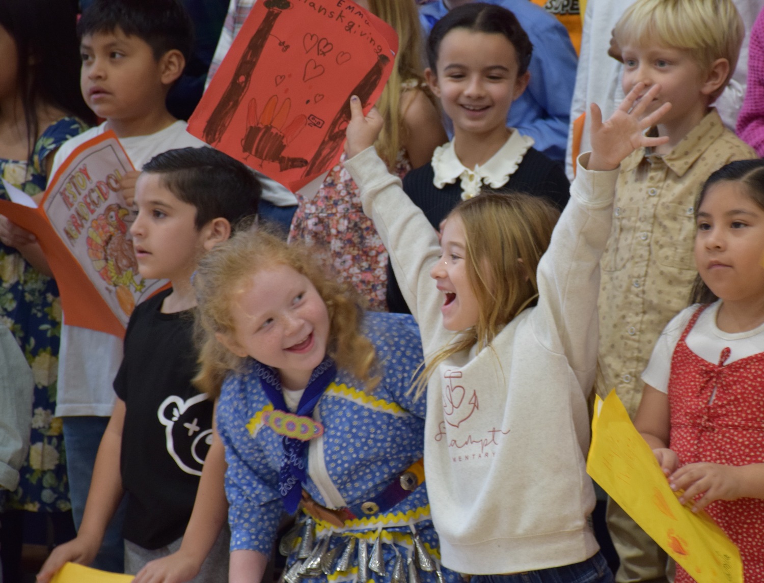 Southampton Elementary School hosted its annual second grade Thanksgiving gathering on November 21. The event focused on family and community, with students performing songs, sharing a Thanksgiving poem and enjoying food with their families. Also, during the event, representatives from the Shinnecock Indian Nation spoke about their traditions related to giving thanks, performed a traditional dance and song with students and gave a blessing. COURTESY SOUTHAMPTON SCHOOL DISTRICT