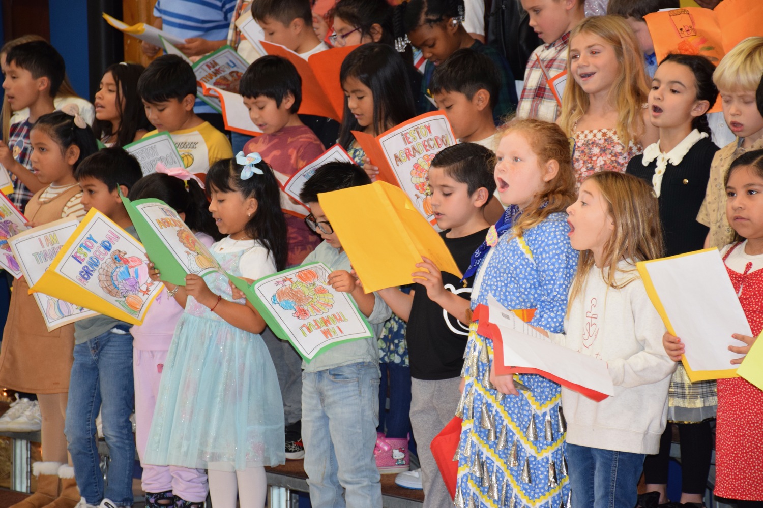 Southampton Elementary School hosted its annual second grade Thanksgiving gathering on November 21. The event focused on family and community, with students performing songs, sharing a Thanksgiving poem and enjoying food with their families. Also, during the event, representatives from the Shinnecock Indian Nation spoke about their traditions related to giving thanks, performed a traditional dance and song with students and gave a blessing. COURTESY SOUTHAMPTON SCHOOL DISTRICT