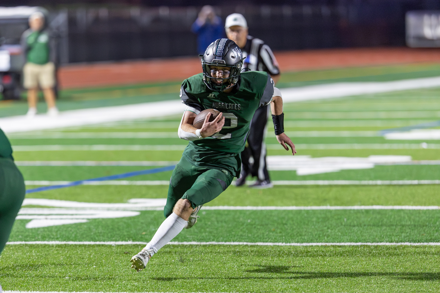 Westhampton Beach senior quarterback Finn Drake finds some open room to gain yards on Friday night.   RON ESPOSITO