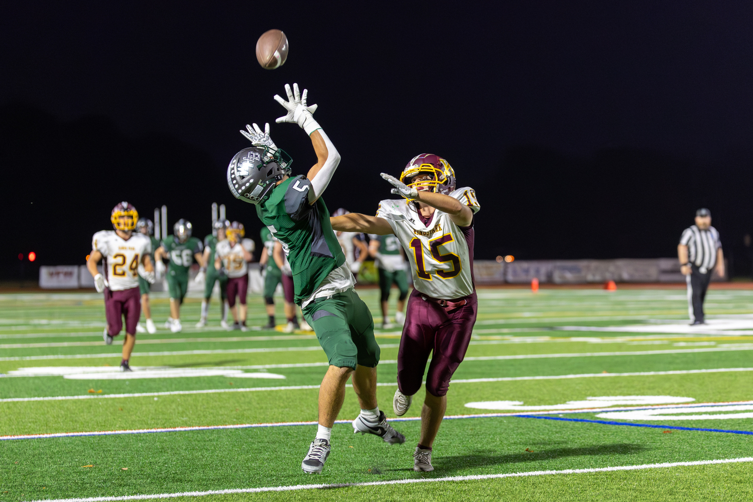 Westhampton Beach senior Brody Spanbock is ready to catch a 31-yard pass play from senior quarterback Finn Drake.   RON ESPOSITO