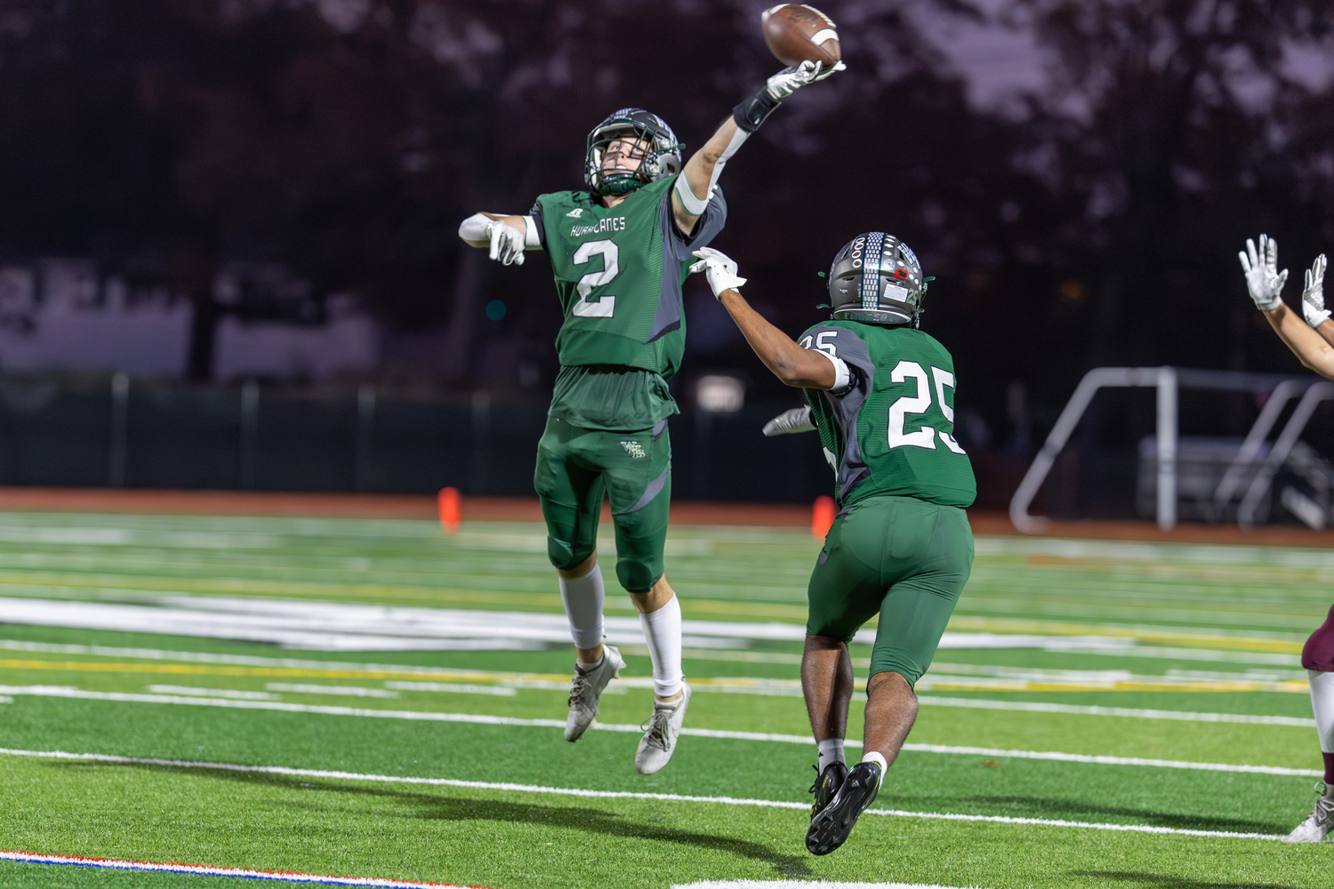 Westhampton Beach senior Finn Drake tips a pass.   RON ESPOSITO