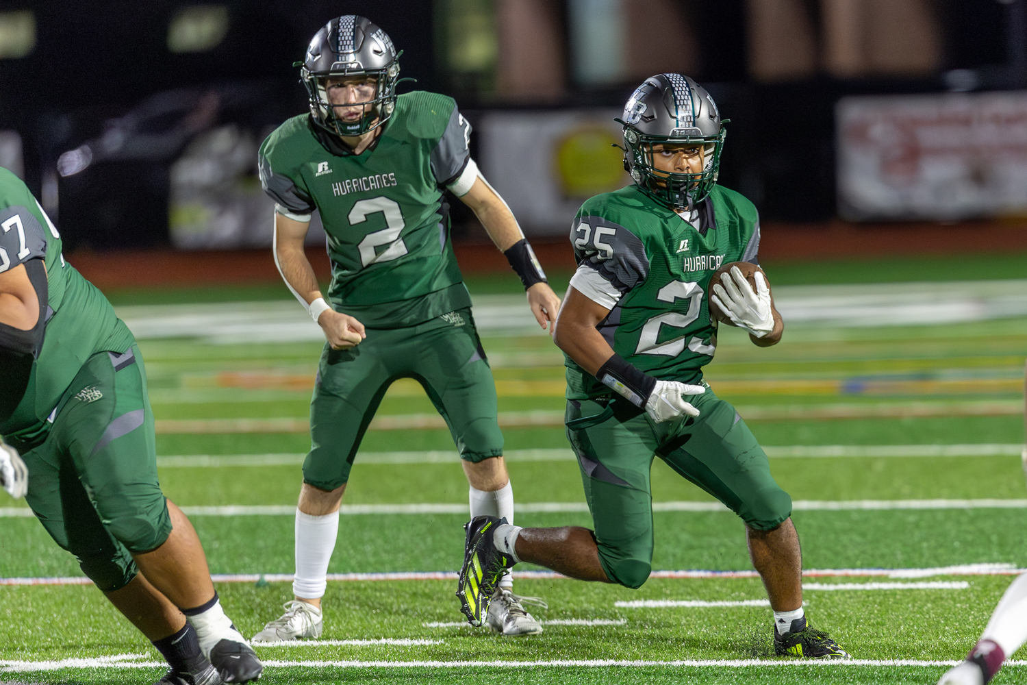 Westhampton Beach junior Nick Simone takes a handoff from senior quarterback Finn Drake and looks for some open space.   RON ESPOSITO