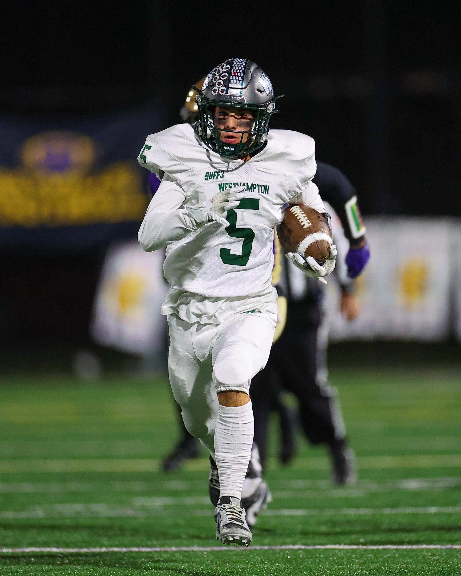 Westhampton Beach senior receiver Brady Spanbock runs upfield for a big gain.  TIMOTHY BUTLER