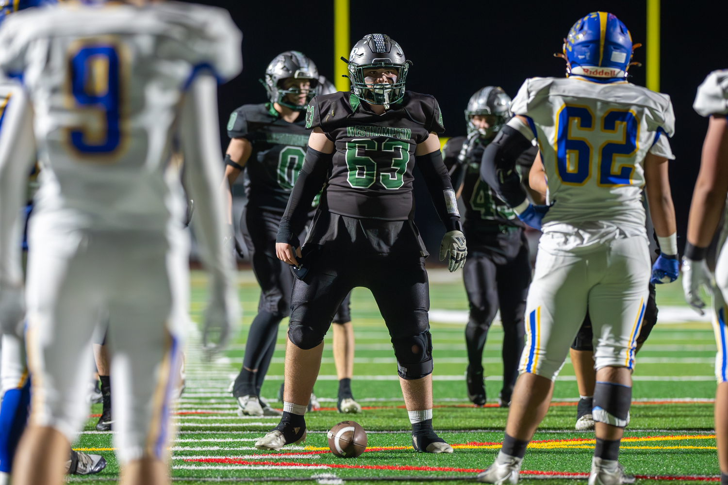 Westhampton Beach senior center Andrew Weeks stands over the ball.   RON ESPOSITO