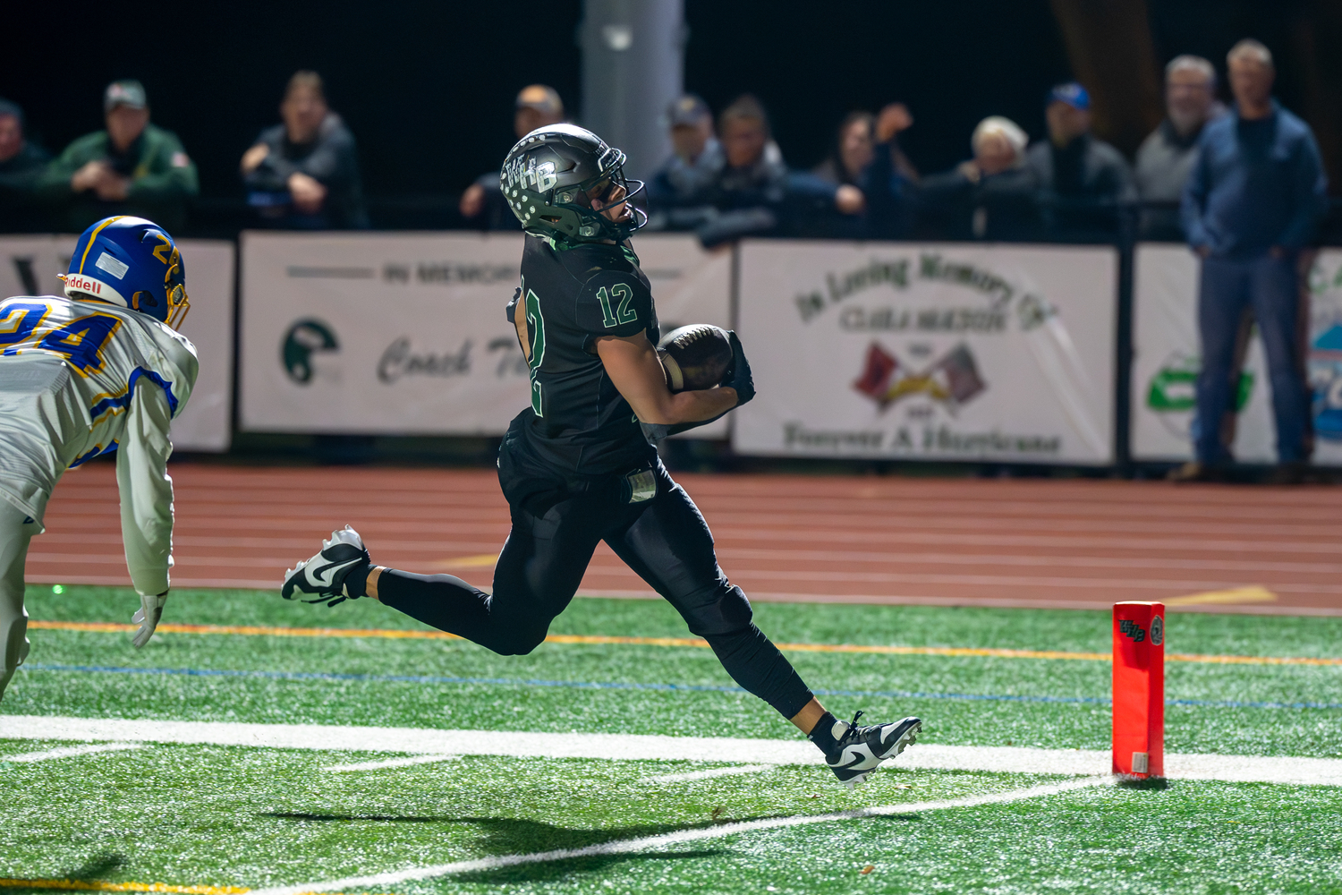 Westhampton Beach senior Brody Schaffer crosses the finish line for one of his two touchdowns on the night.   RON ESPOSITO