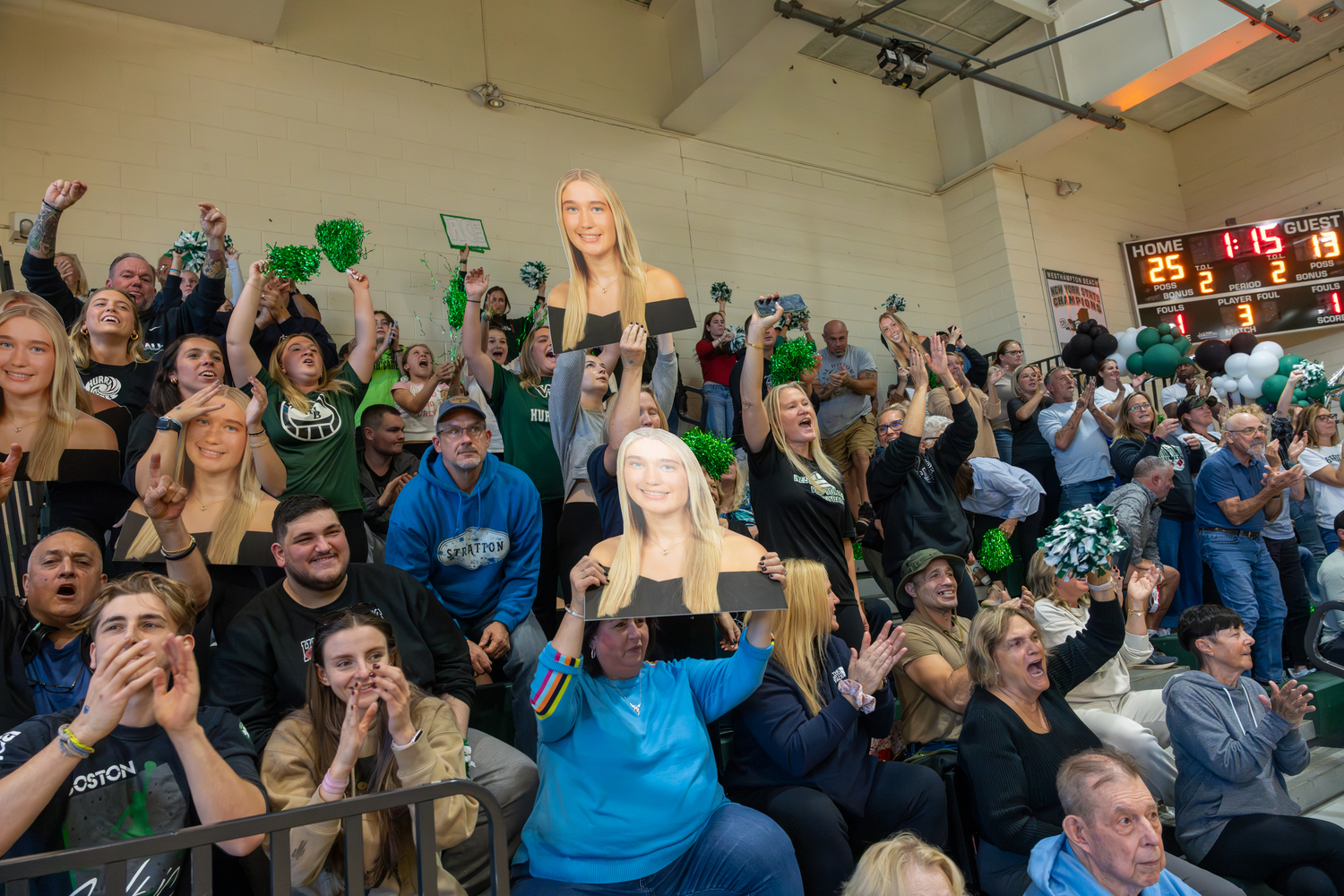 Westhampton Beach's home crowd cheers on its girls volleyball team. RON ESPOSITO