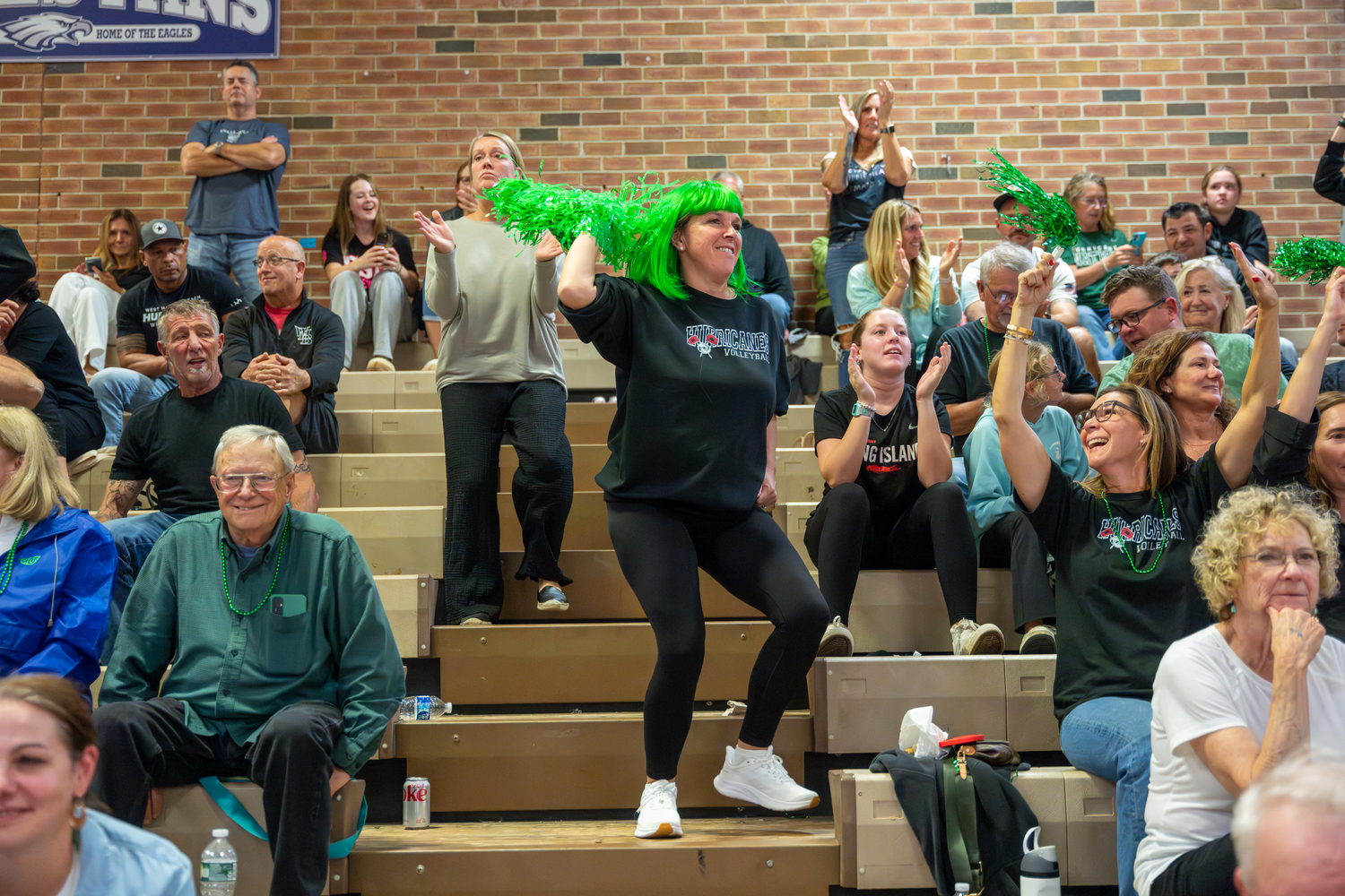 A Westhampton Beach fan hypes up the crowd during the fourth set. RON ESPOSITO