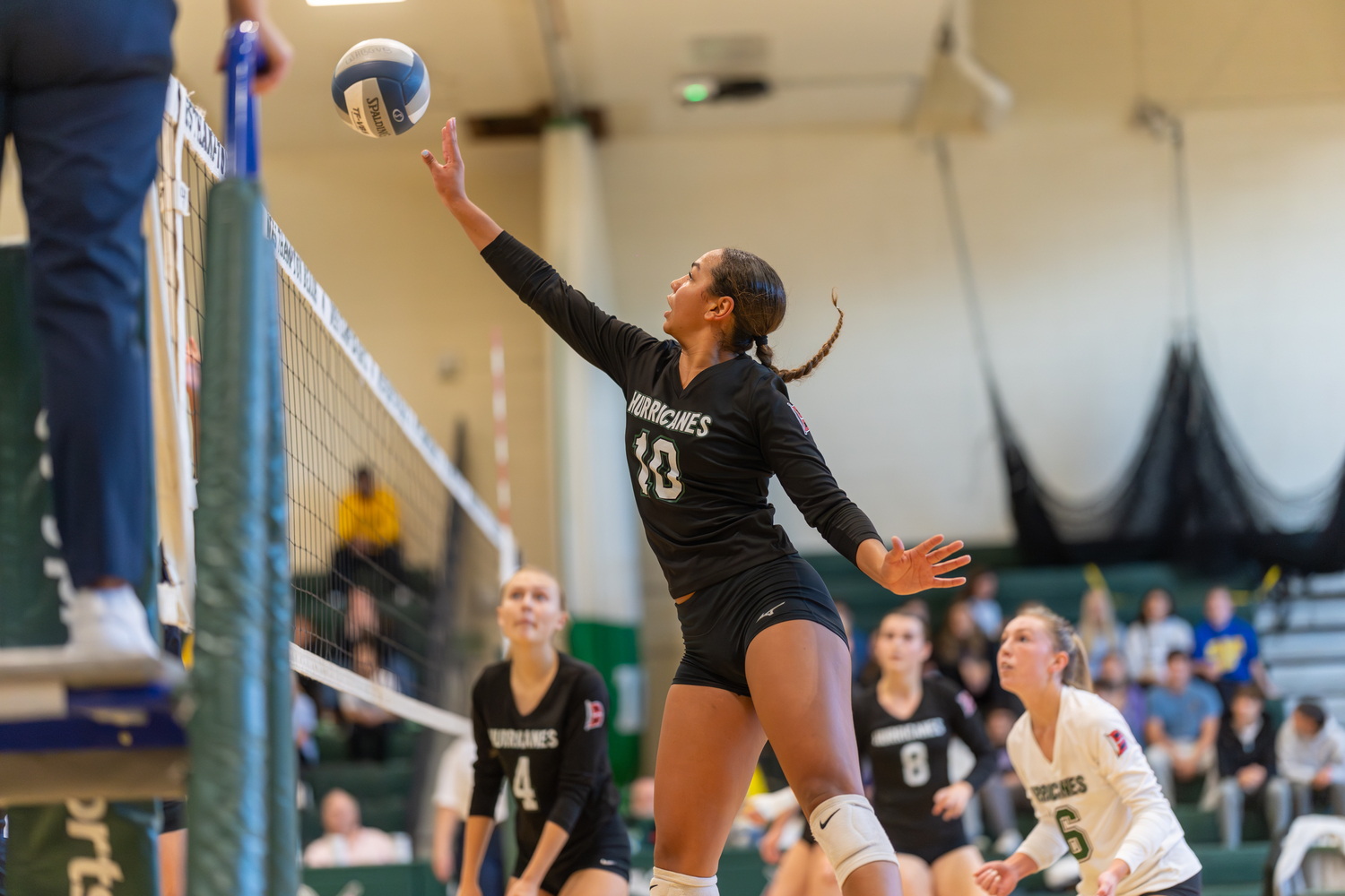 Westhampton Beach junior outside hitter Jasmine Taylor pushes the ball over the net. RON ESPOSITO