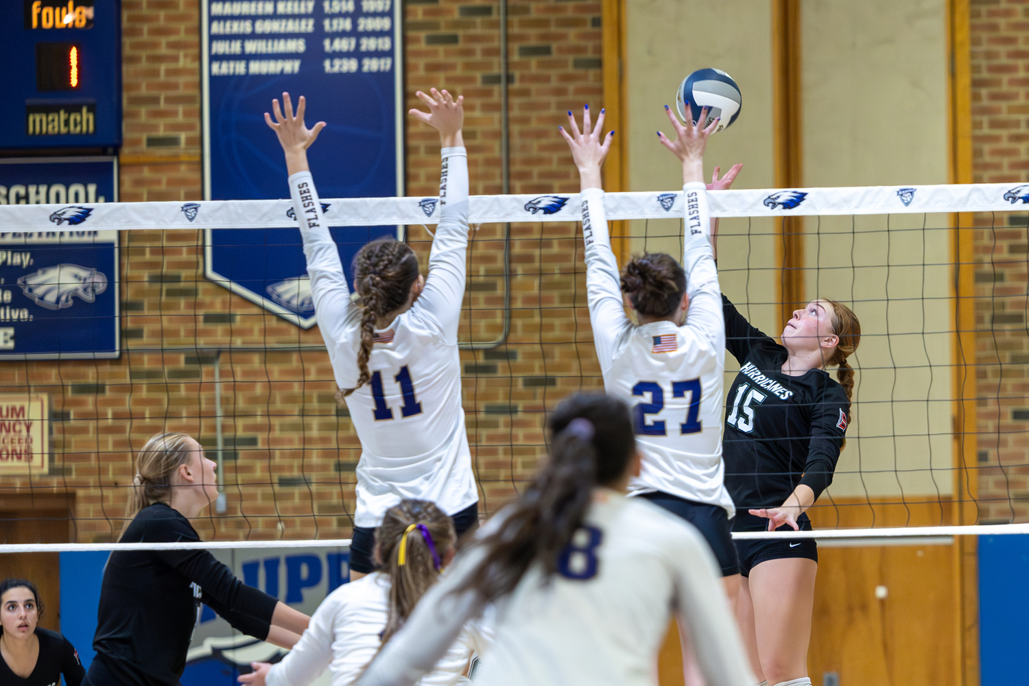 Junior outside hitter Katie Burke spikes the ball. RON ESPOSITO