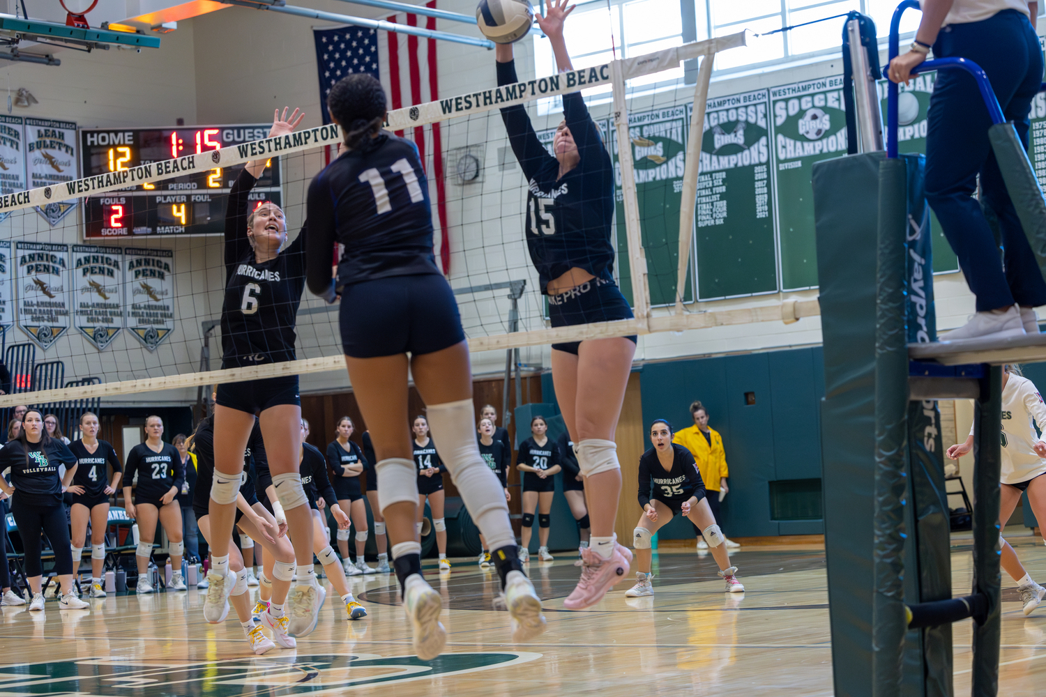 Westhampton Beach junior outside hitter Katie Burke comes up with a block. RON ESPOSITO